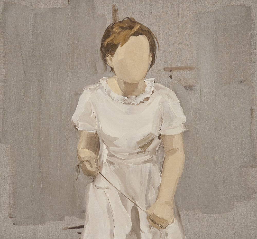 Faceless girl wearing white dress holds a piece of string between her hands in front of a gray and exposed canvas background.
