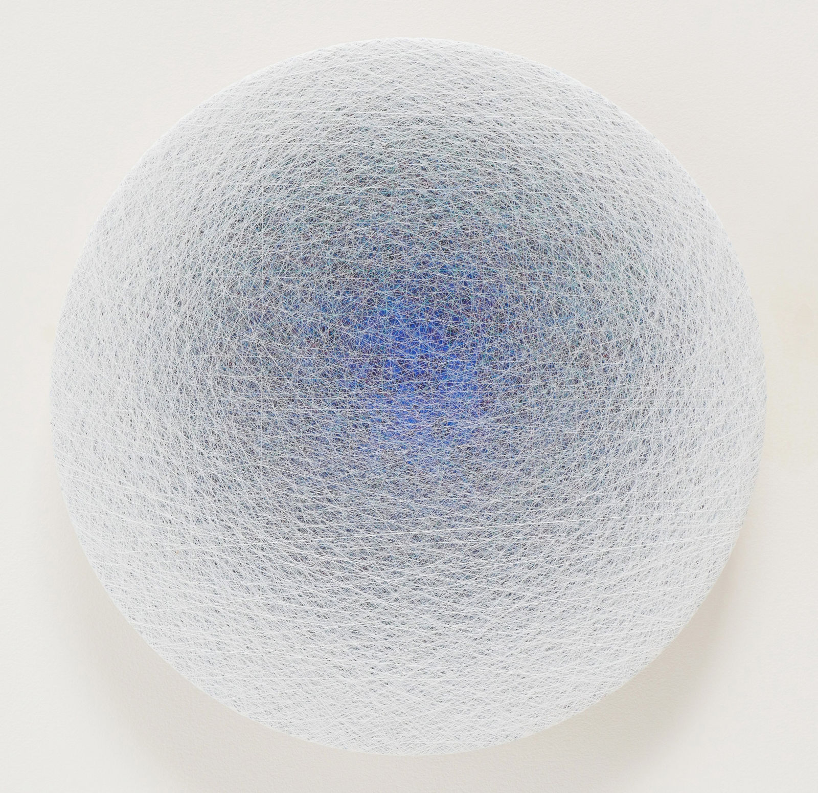 circular thread painting, ombre edge to offset center, white to bright blue