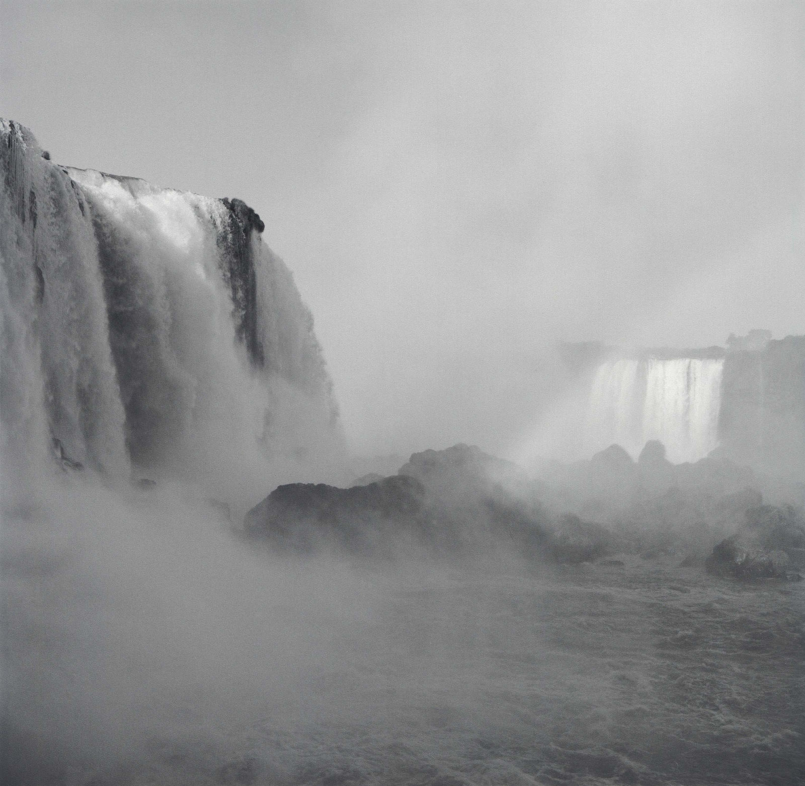Lynn Davis photograph of Iguazu Falls waterfall from Brazil side with mist rising