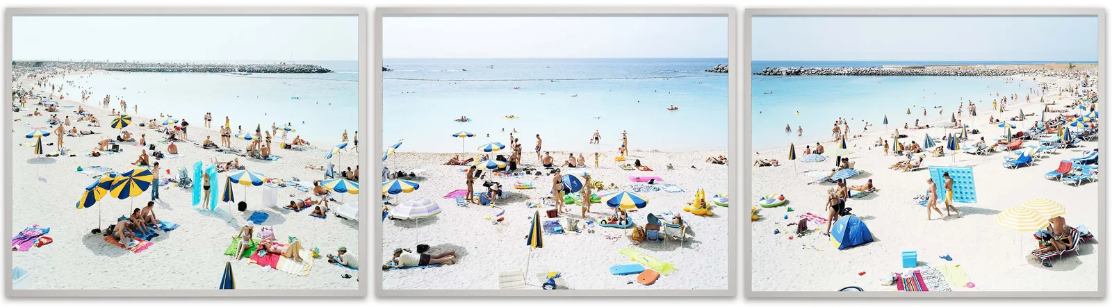 Triptych of beachgoers under bright umbrellas with towels, by Massimo VItali