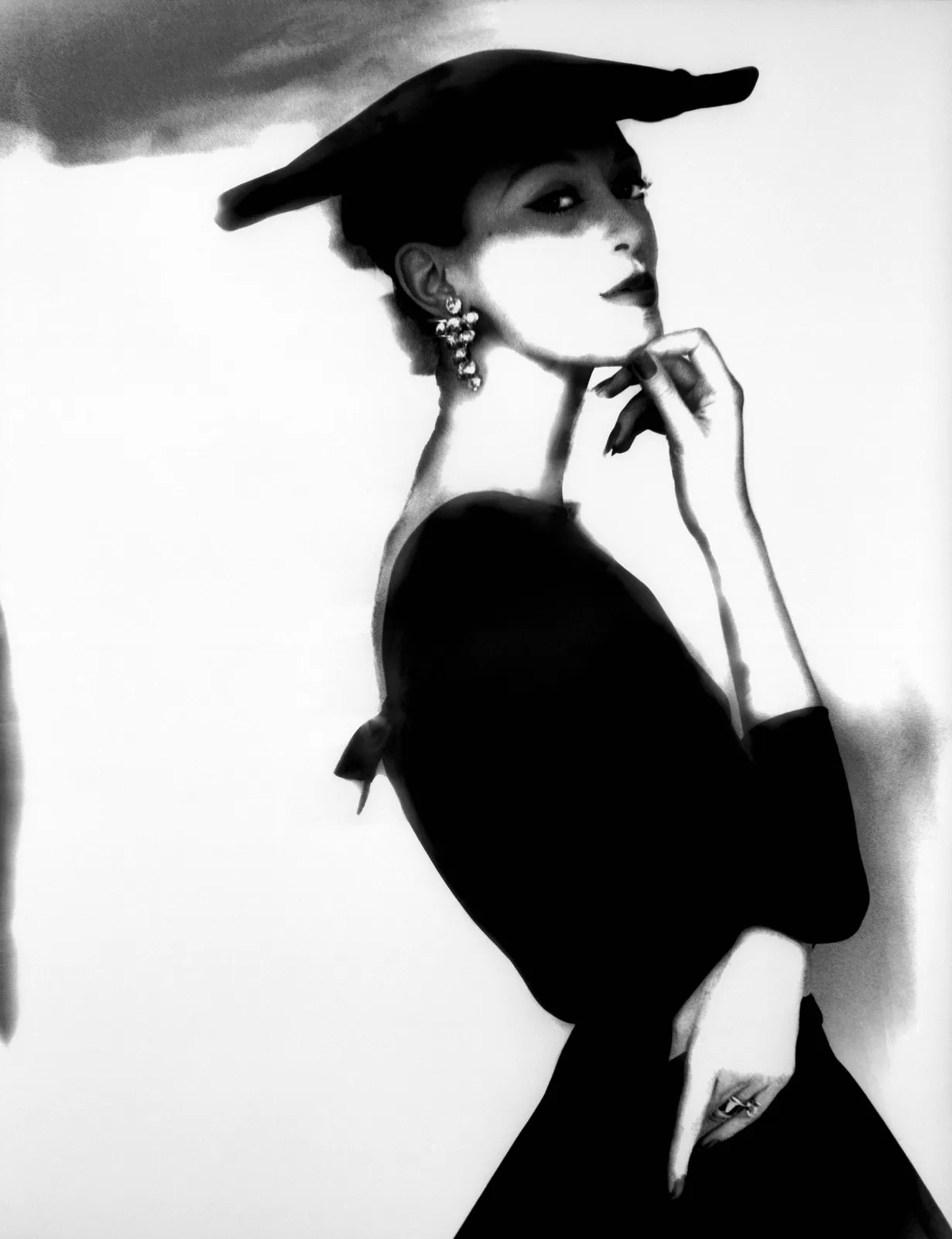 Barbara Mullen photographed by Lillian Bassman, in hat for Harper's Bazaar, gelatin silver print, mid-20th century fashion photography