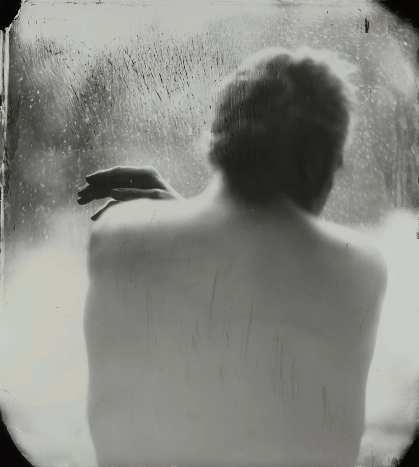 Portrait of Larry Mann from behind, by Sally Mann