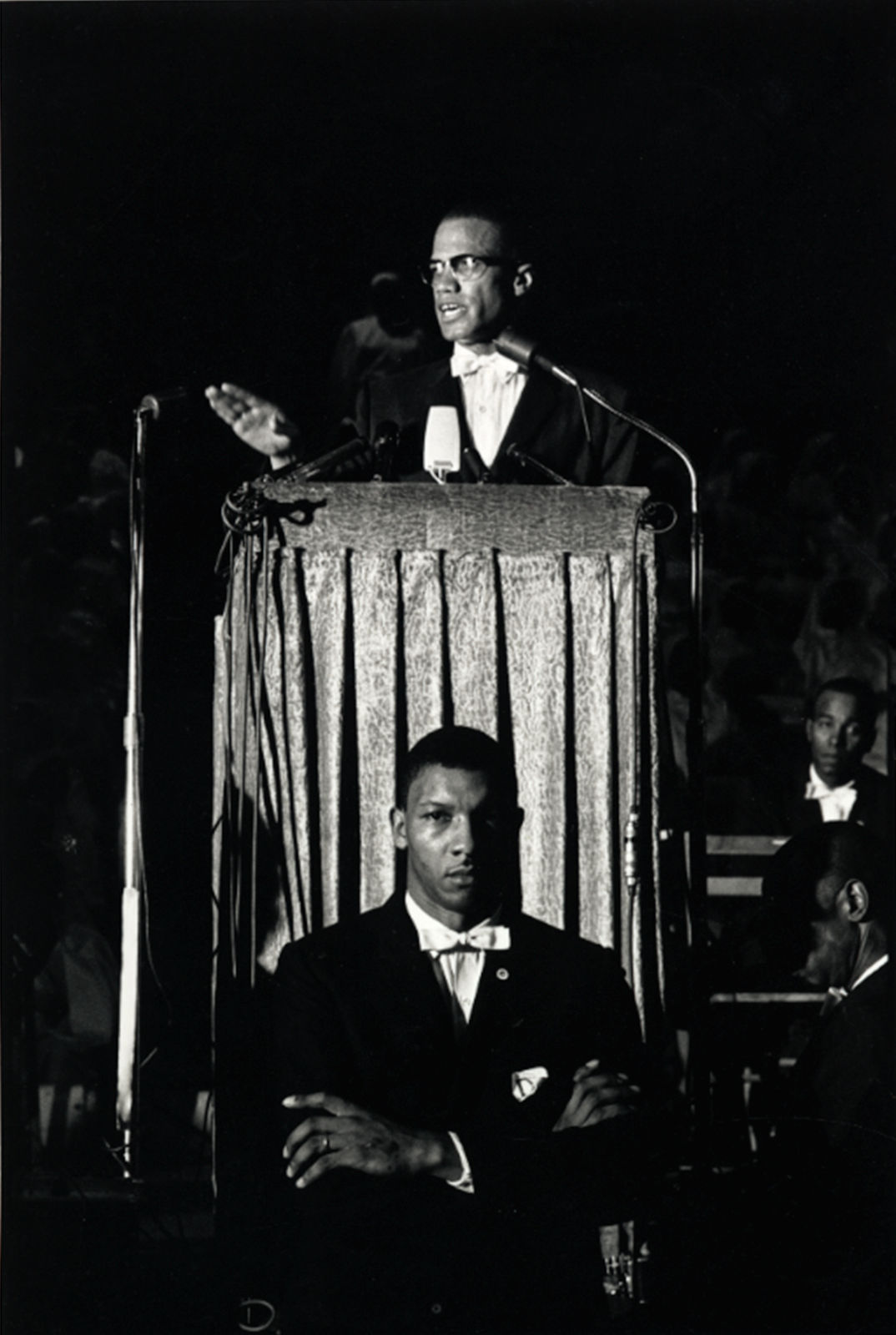 Eve Arnold, American Muslim minister and human rights activist Malcolm X giving a speech at a Nation of Islam rally, Washington, USA, 1961
