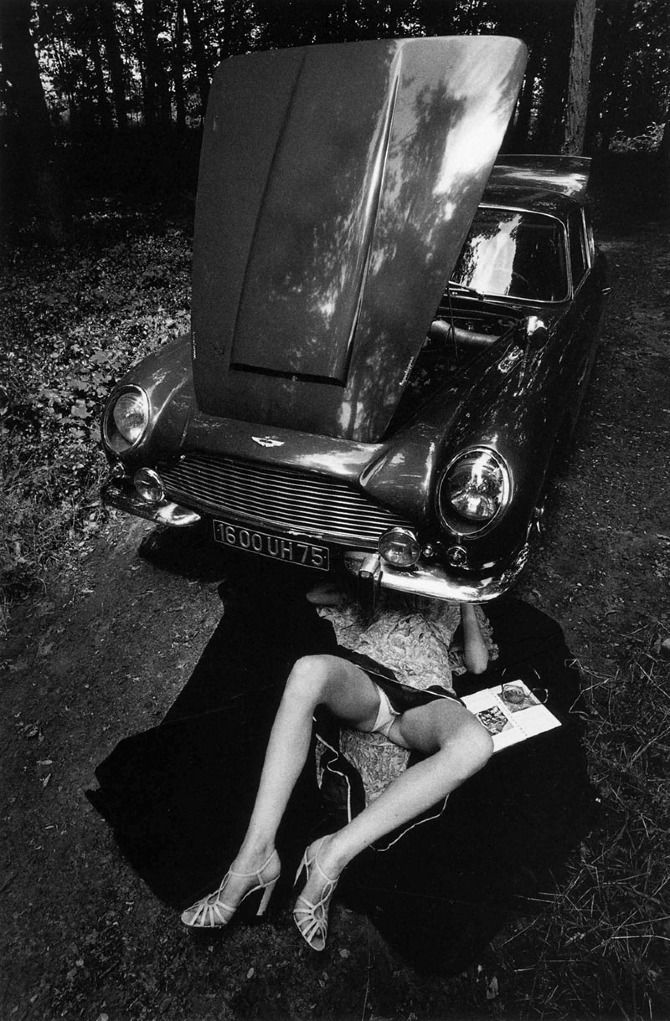 Jeanloup Sieff, Alone Under a Car with Open Hood, Paris, 1975