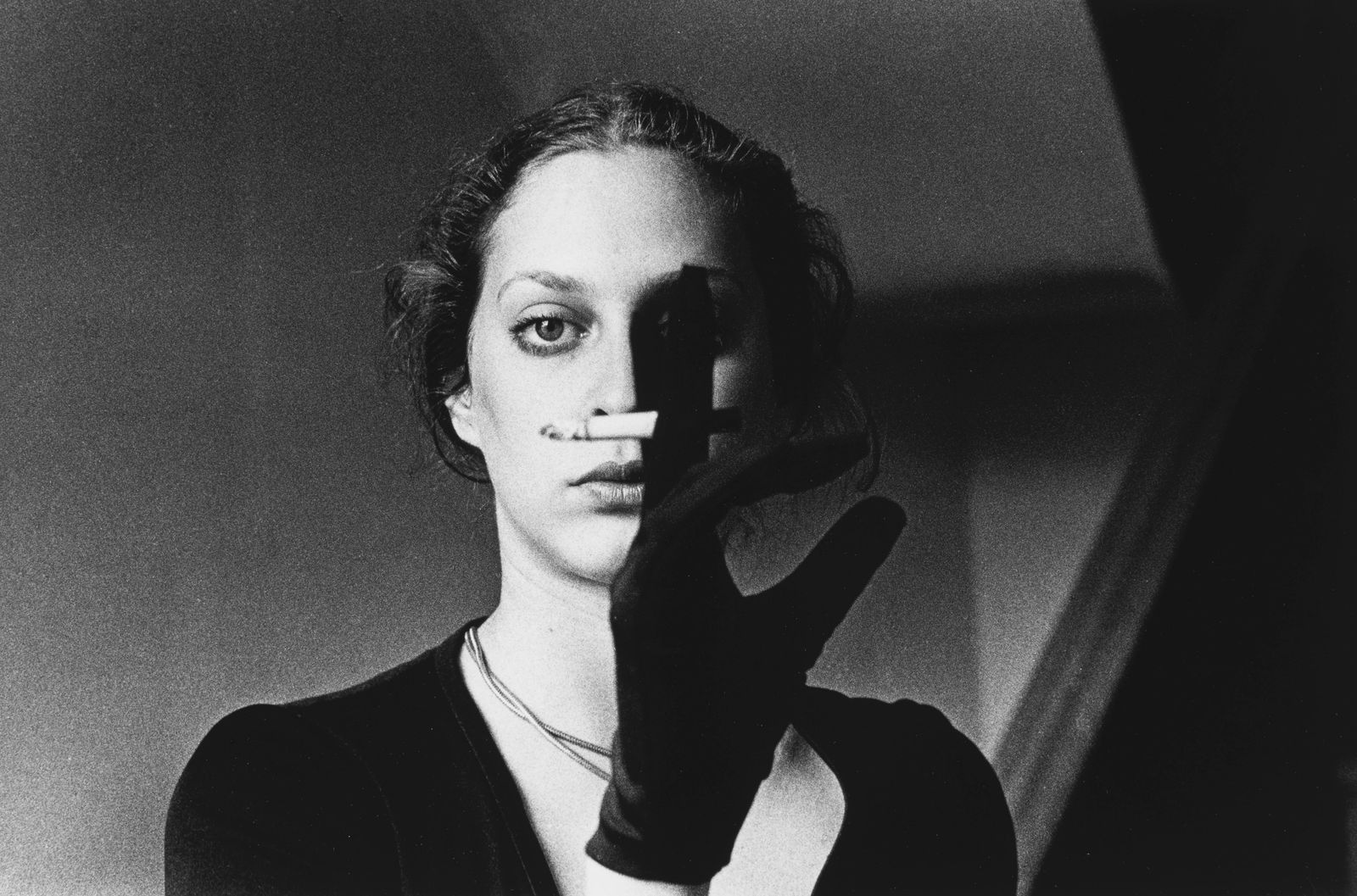 Ralph Gibson, Untitled (woman with cigarette), 1974