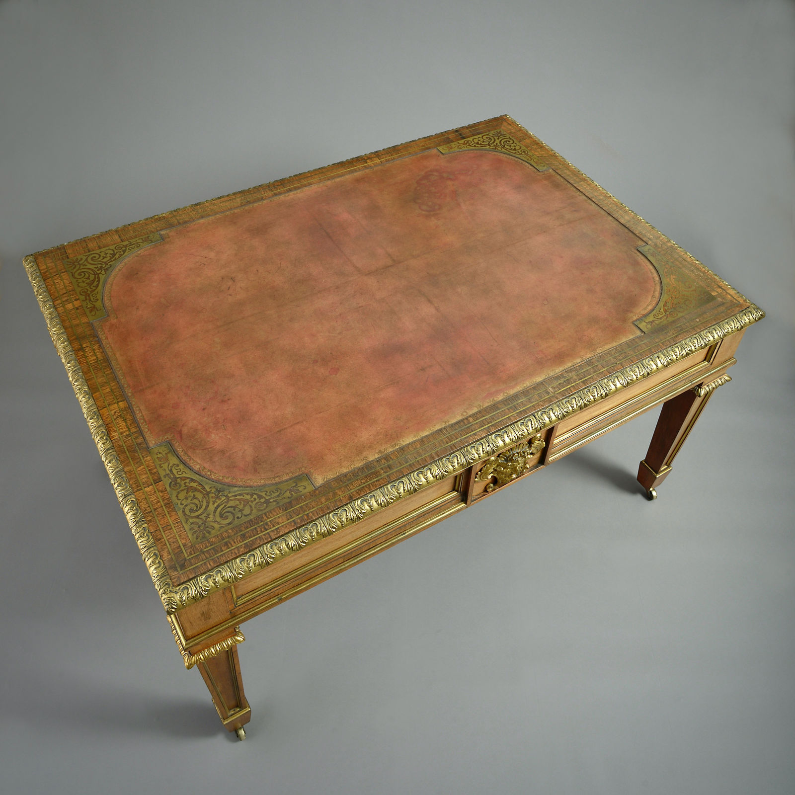 REGENCY ORMOLU-MOUNTED ROSEWOOD WRITING TABLE BY LOUIS LE GAIGNEUR