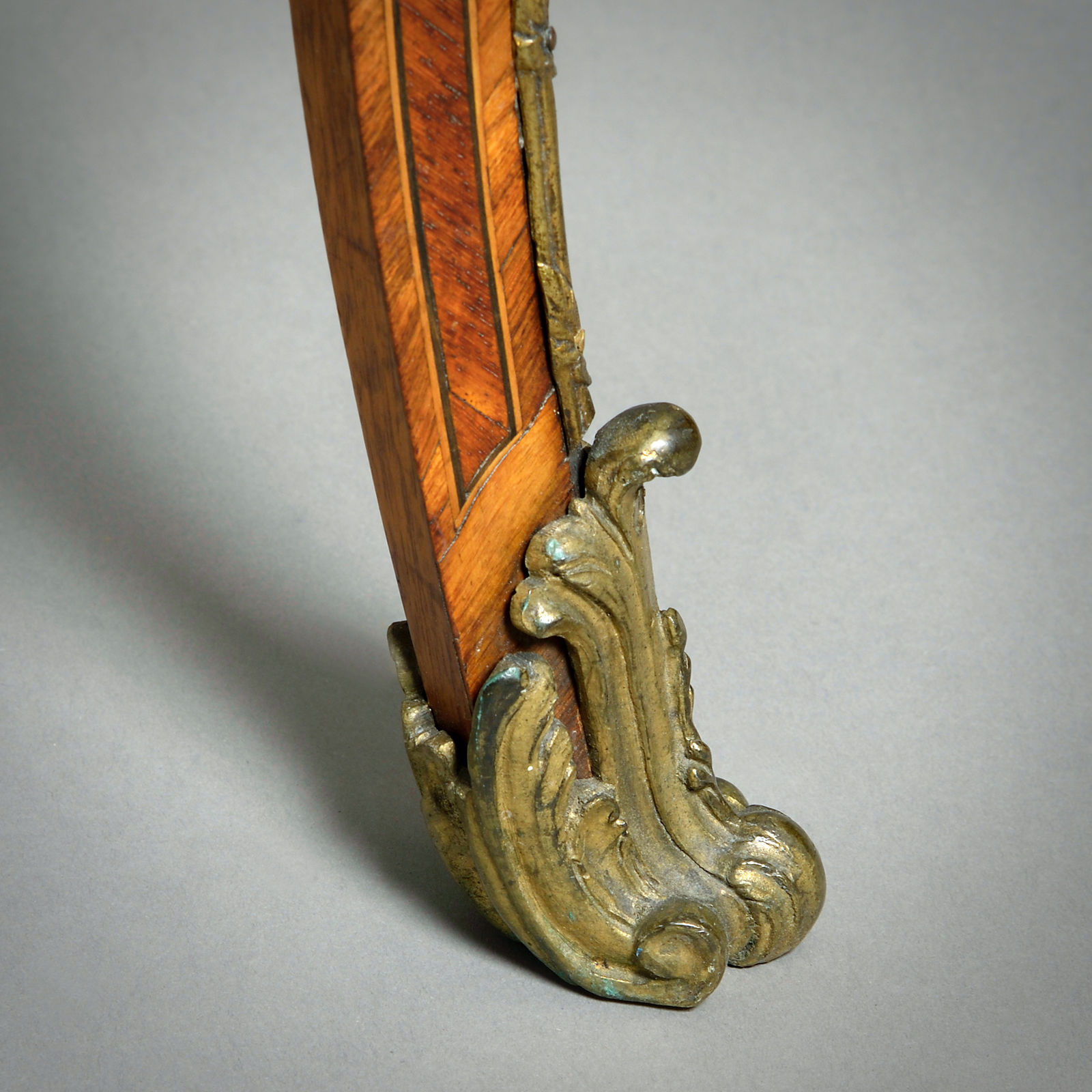 EARLY VICTORIAN PORCELAIN AND ORMOLU-MOUNTED KINGWOOD BUREAU-PLAT