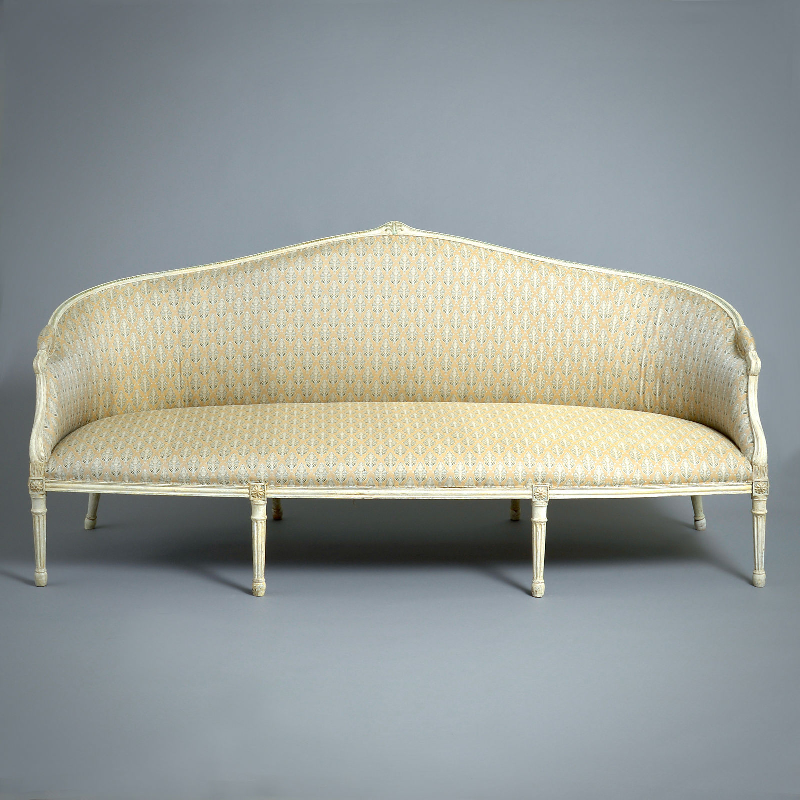 PAIR OF GEORGE III GREEN AND WHITE PAINTED SOFAS ATTRIBUTED TO JOHN LINNELL