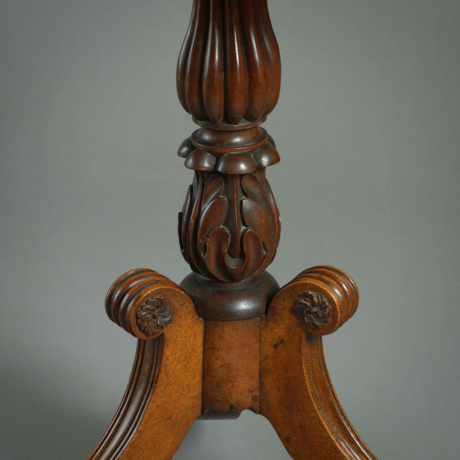 REGENCY AMBOYNA AND OAK TILT-TOP CENTRE TABLE