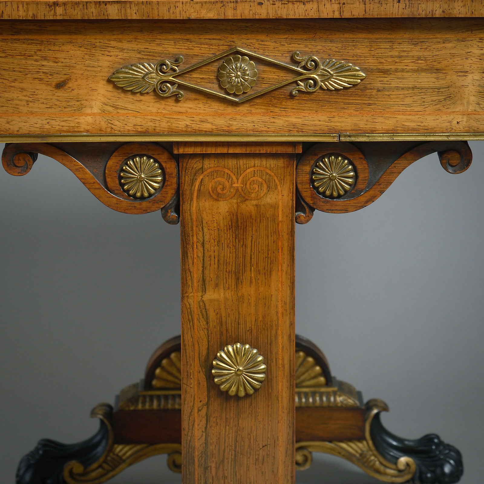 REGENCY ORMOLU-MOUNTED, BRASS-INLAID AND PARCEL-GILT WRITING TABLE