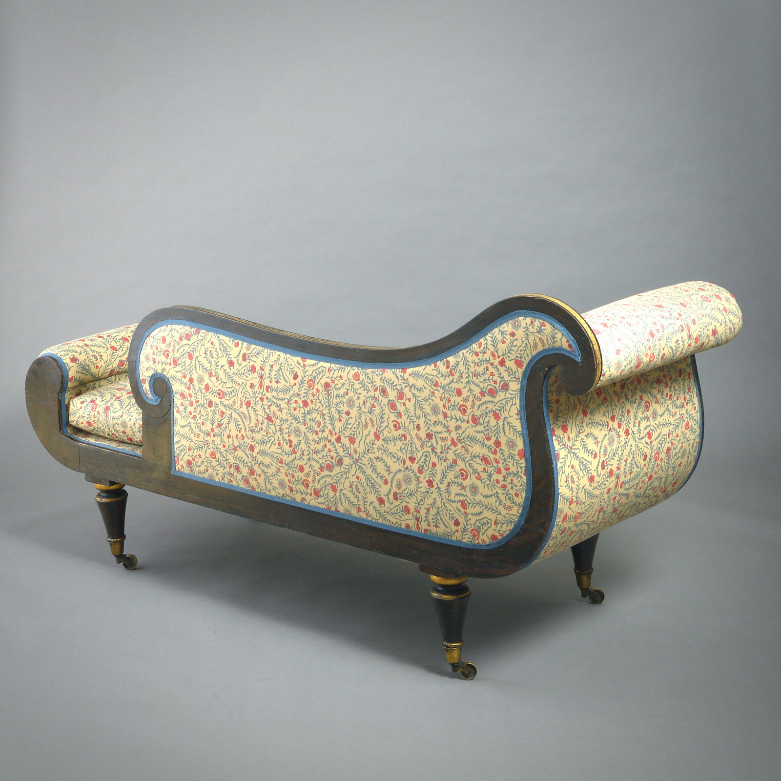 PAIR OF REGENCY GRAINED AND PARCEL-GILT CHAISE LONGUES