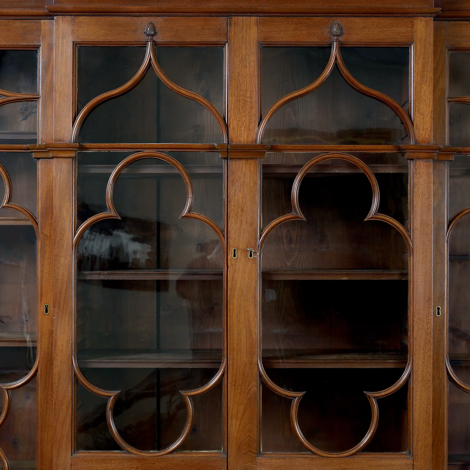 GEORGE III GOTHIC MAHOGANY BREAK-FRONT BOOKCASE