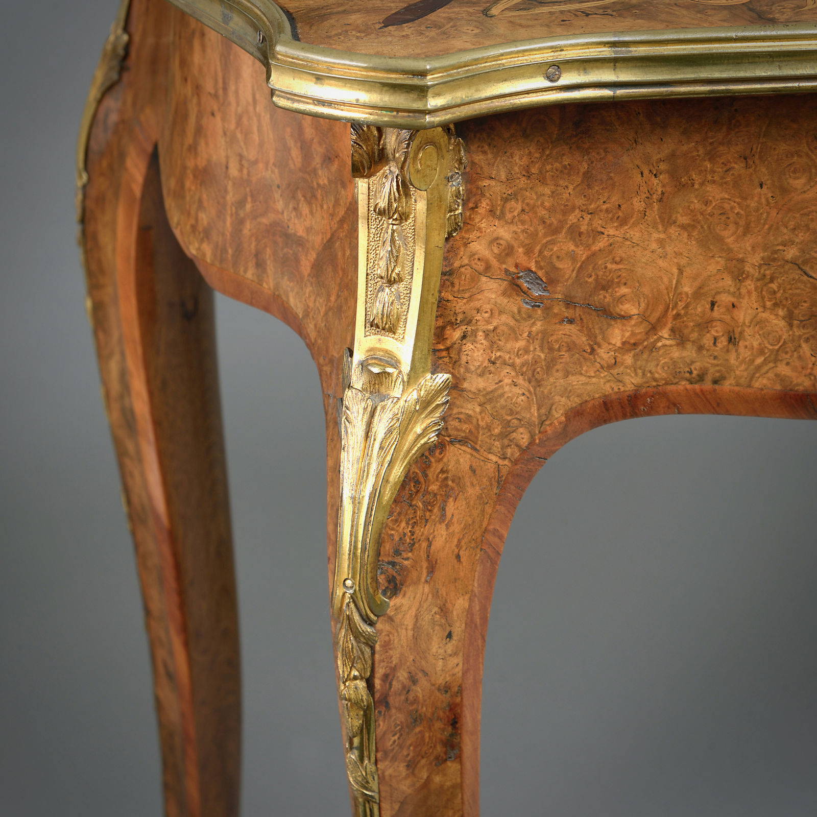EARLY VICTORIAN ORMOLU-MOUNTED BURR-WALNUT AND MARQUETRY WRITING-TABLE
