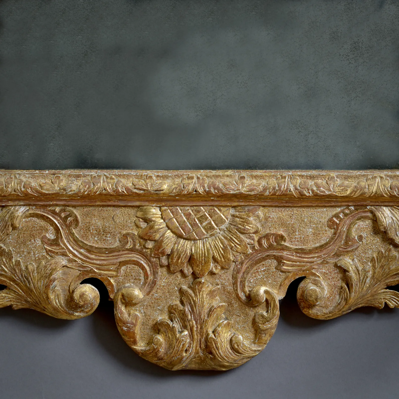 GEORGE II CARVED GILTWOOD AND GESSO MIRROR