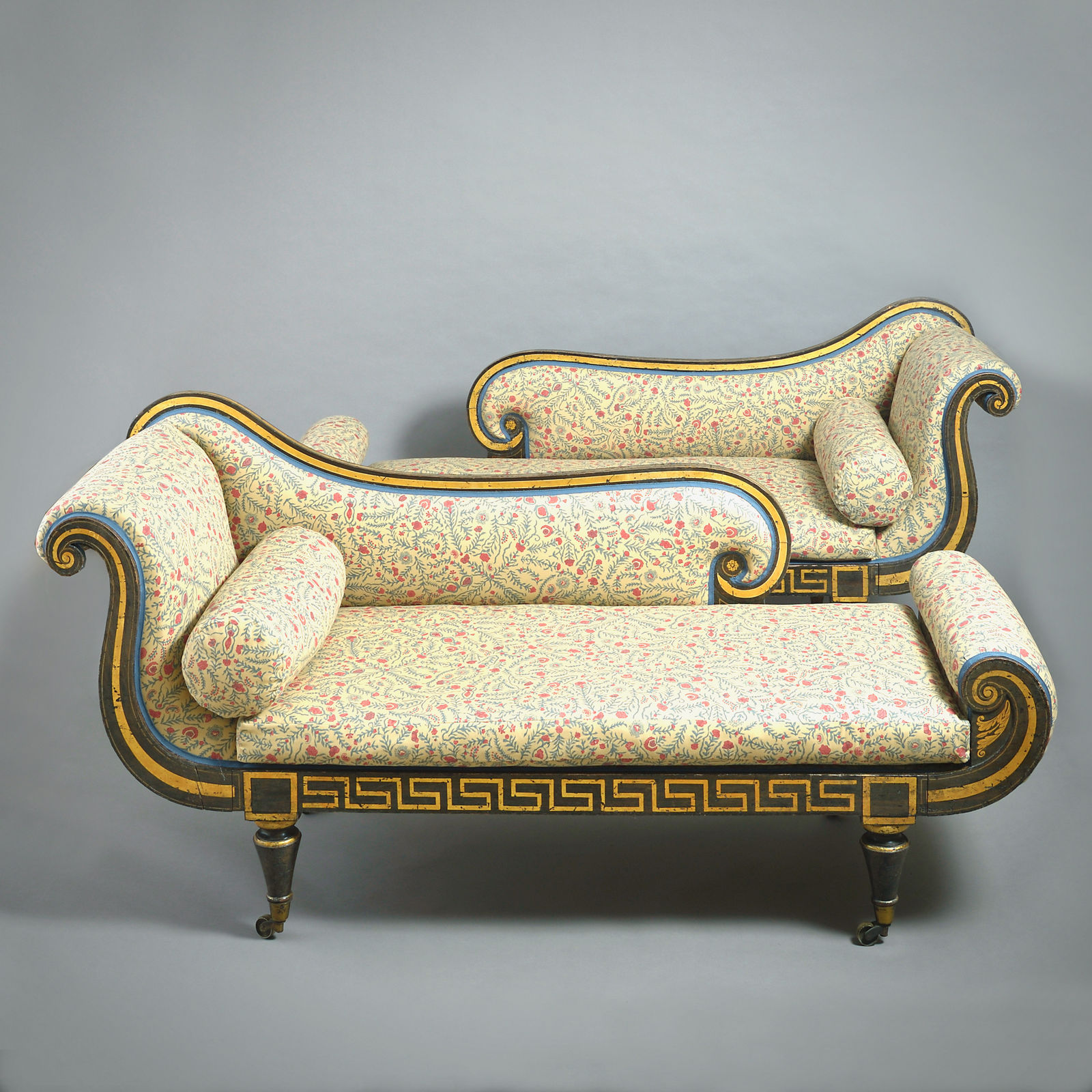 PAIR OF REGENCY GRAINED AND PARCEL-GILT CHAISE LONGUES