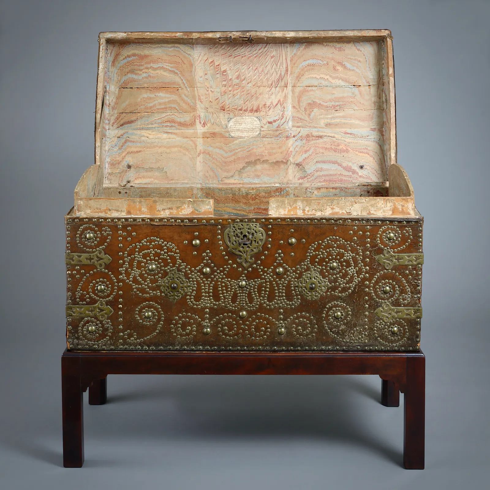 GEORGE II BRASS-STUDDED LEATHER TRUNK ON STAND