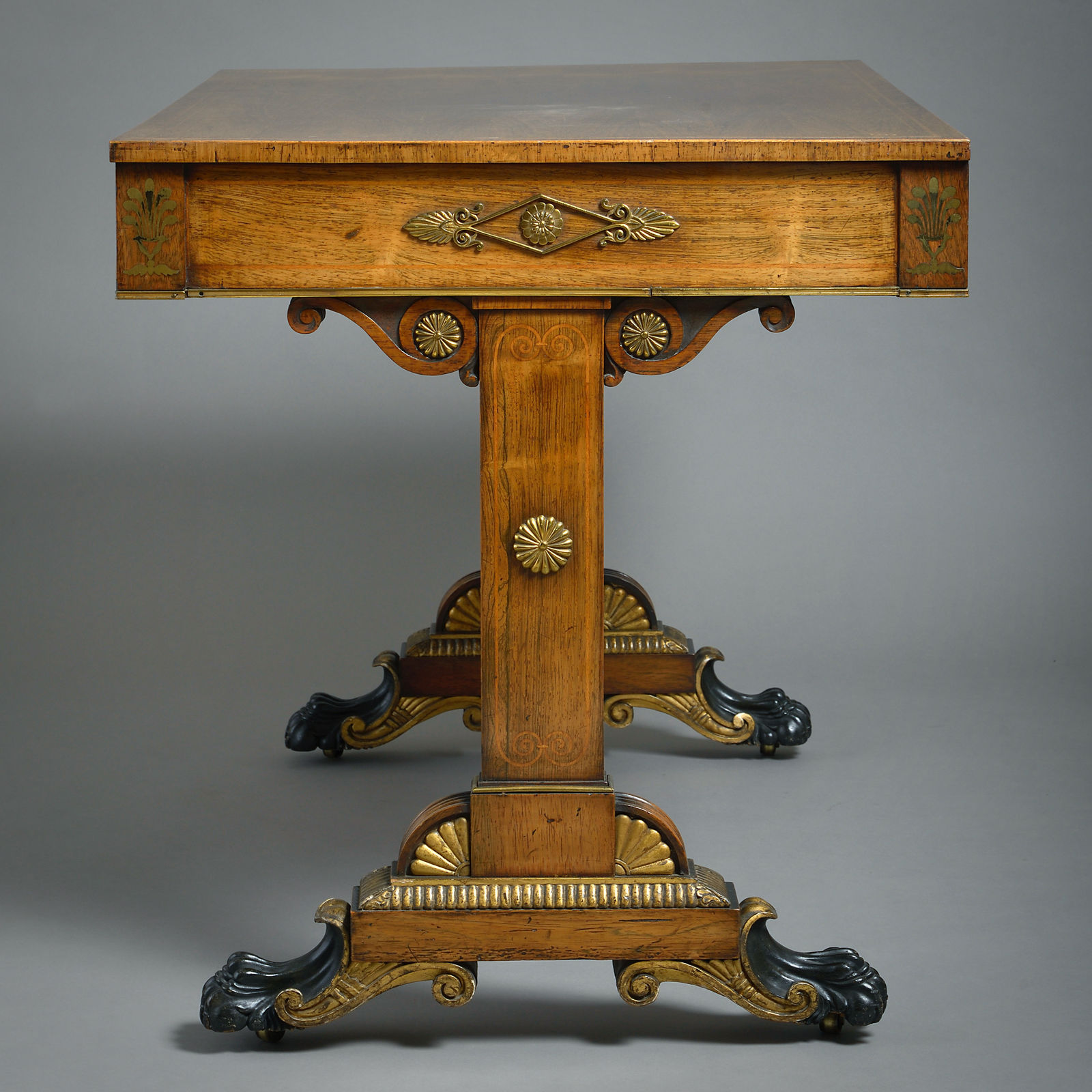 REGENCY ORMOLU-MOUNTED, BRASS-INLAID AND PARCEL-GILT WRITING TABLE