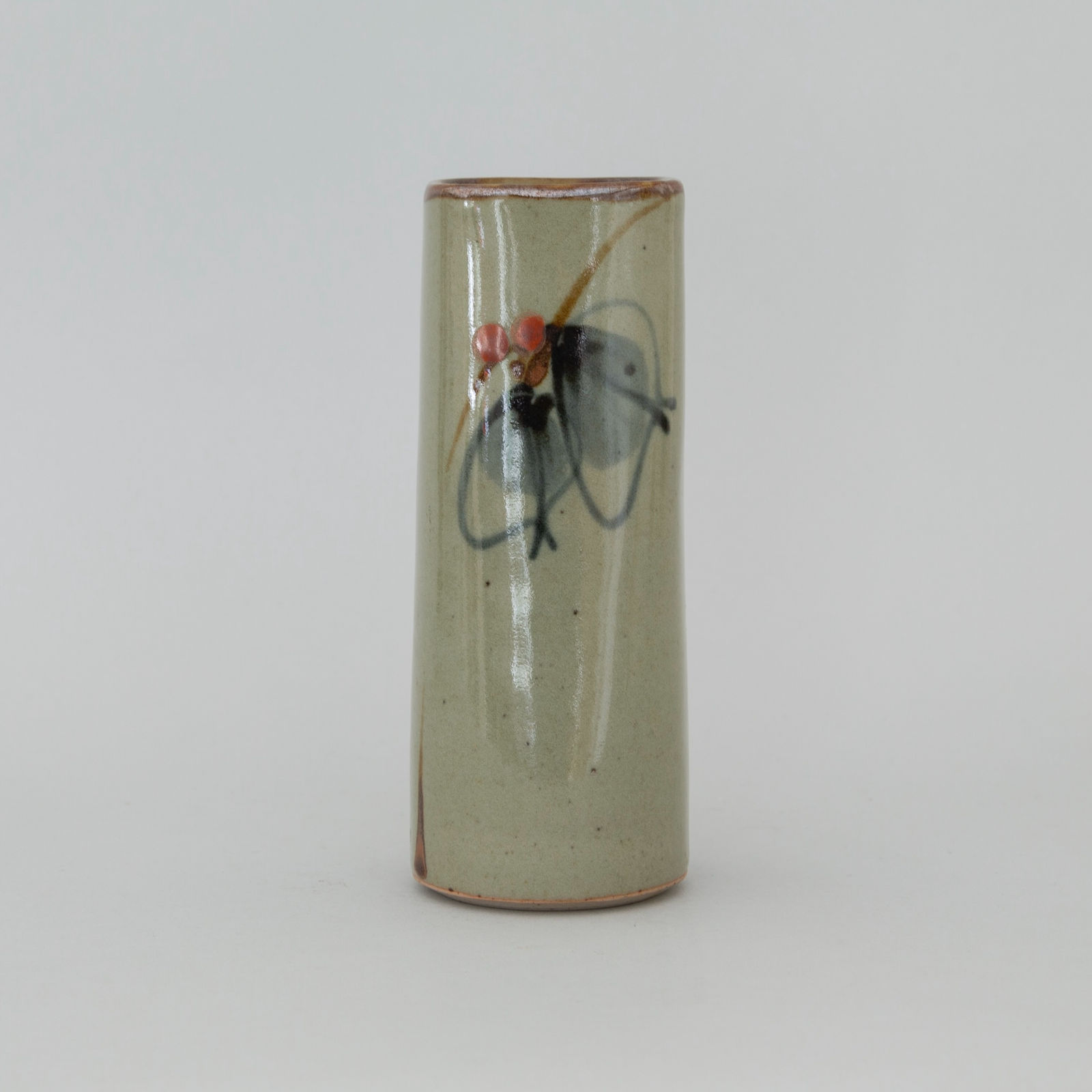 Dartington Pottery, Tall vessel with floral motifs