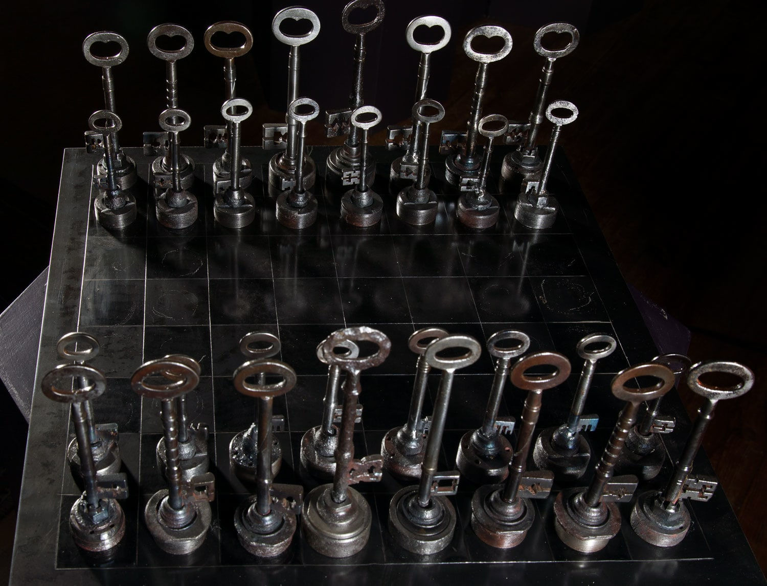 Helen Denerley, Chess Set - keys with table and chairs, 2023