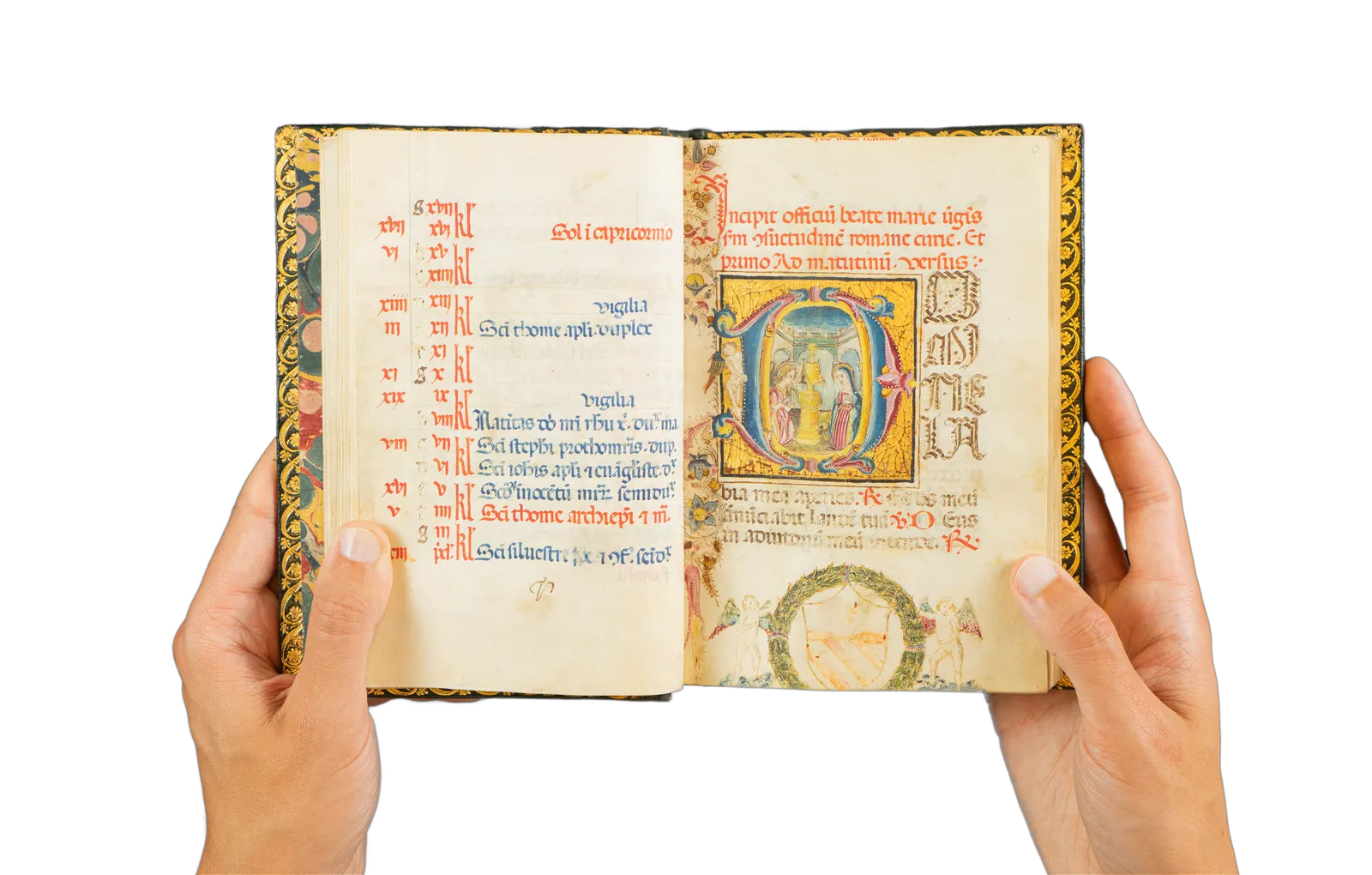 A richly illuminated medieval manuscript, Italian Book of Hours from Rome, signed and dated by the scribe, with many illuminations and decorative borders, with the page showing the Annunciation