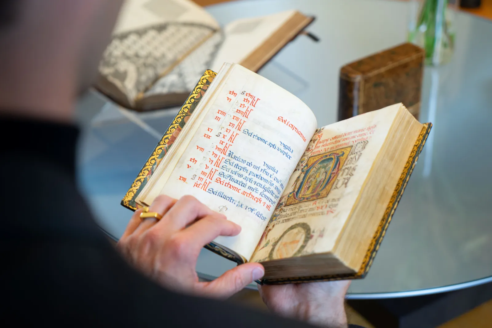 A richly illuminated medieval manuscript, Italian Book of Hours from Rome, signed and dated by the scribe, with many illuminations and decorative borders, in the hand of an art collector