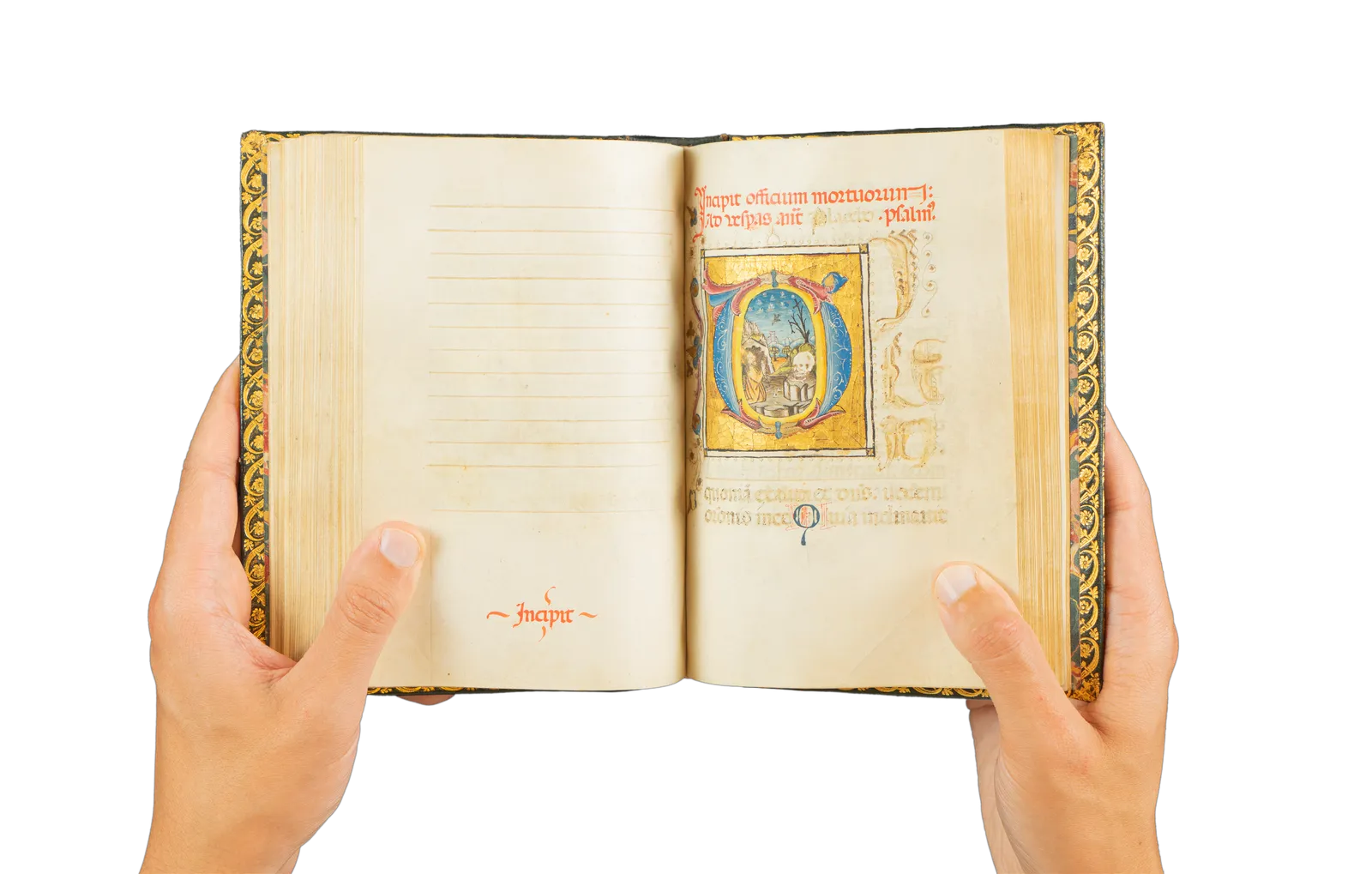A richly illuminated medieval manuscript, Italian Book of Hours from Rome, signed and dated by the scribe, with many illuminations and decorative borders, with the page showing Saint Jerome praying