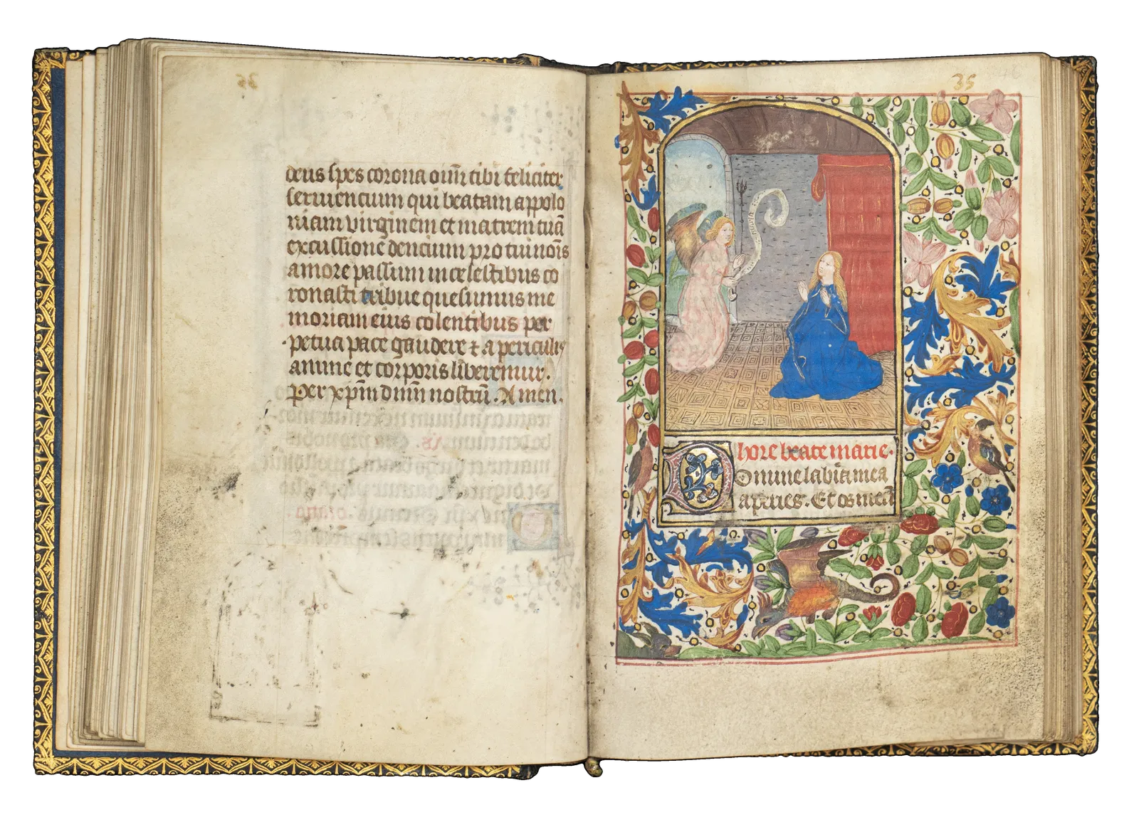 A Book of Hours (use of Rome) produced in Bruges c. 1460 and illuminated by the Mildmay Master. The image shows the illuminated manuscript open on the page of the Annunciation miniature painting.