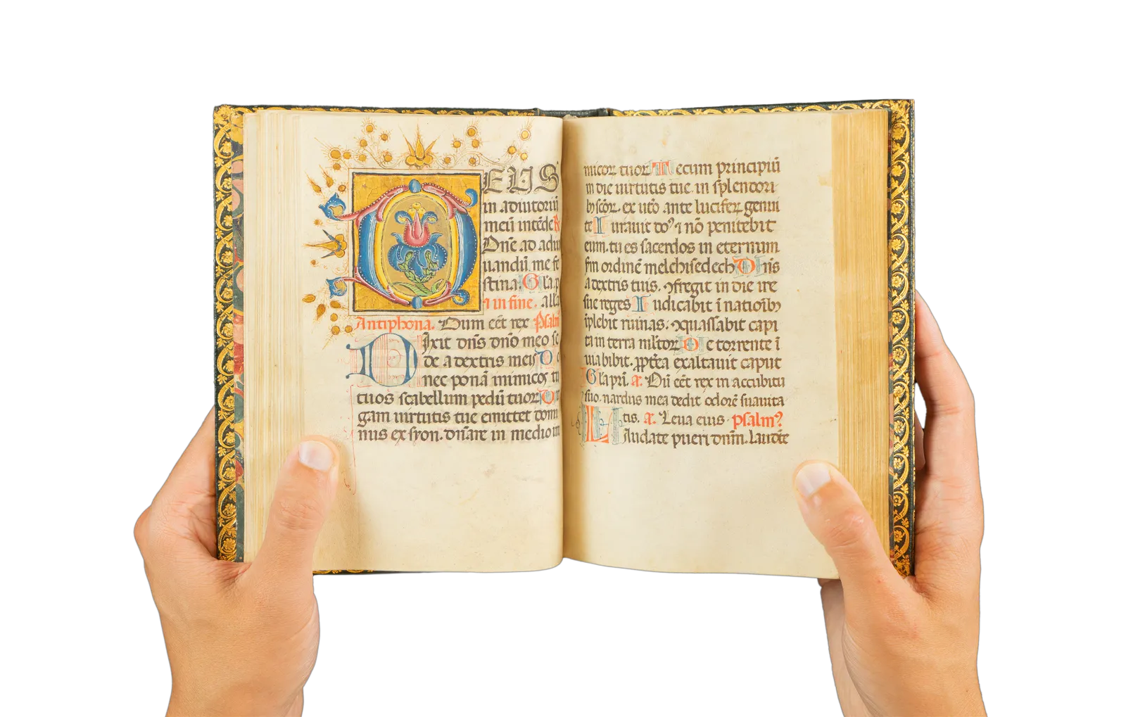 A richly illuminated medieval manuscript, Italian Book of Hours from Rome, signed and dated by the scribe, with many illuminations and decorative borders, with the page showing a colorful flower