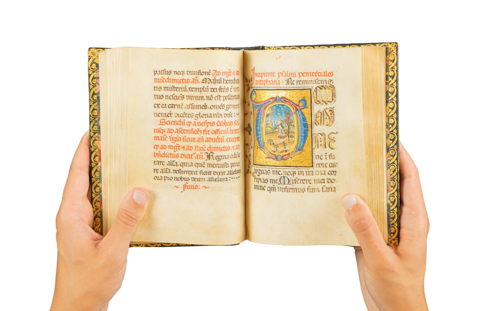 A richly illuminated medieval manuscript, Italian Book of Hours from Rome, signed and dated by the scribe, with many illuminations and decorative borders, with the page showing king David in a beautiful landscape