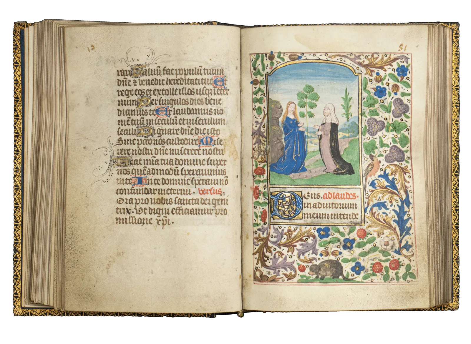 A Book of Hours (use of Rome) produced in Bruges c. 1460 and illuminated by the Mildmay Master. The image shows the illuminated manuscript open on the page of the Visitation miniature painting.