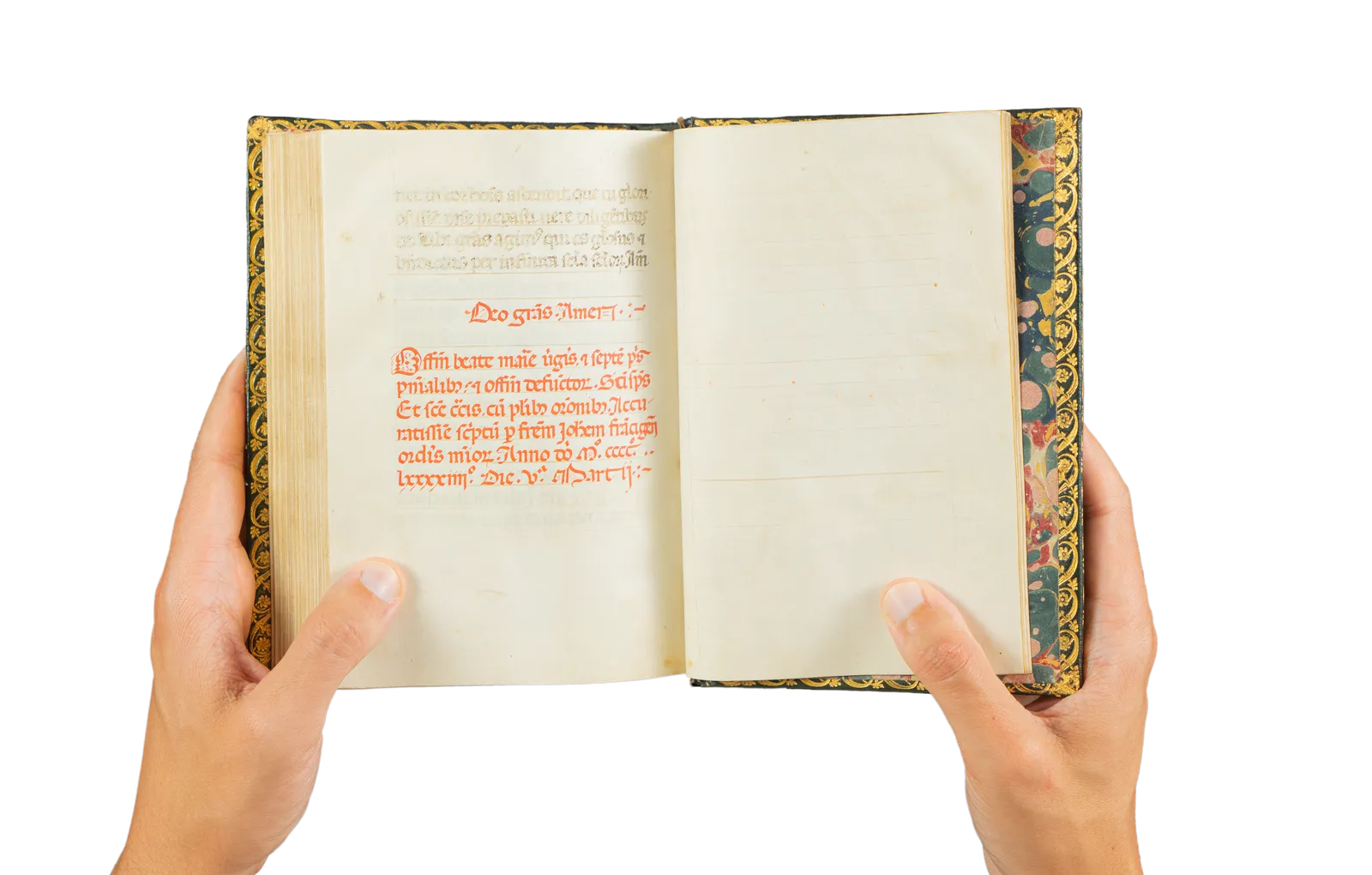 A richly illuminated medieval manuscript, Italian Book of Hours from Rome, signed and dated by the scribe, with many illuminations and decorative borders, with the page showing the signature of the scribe