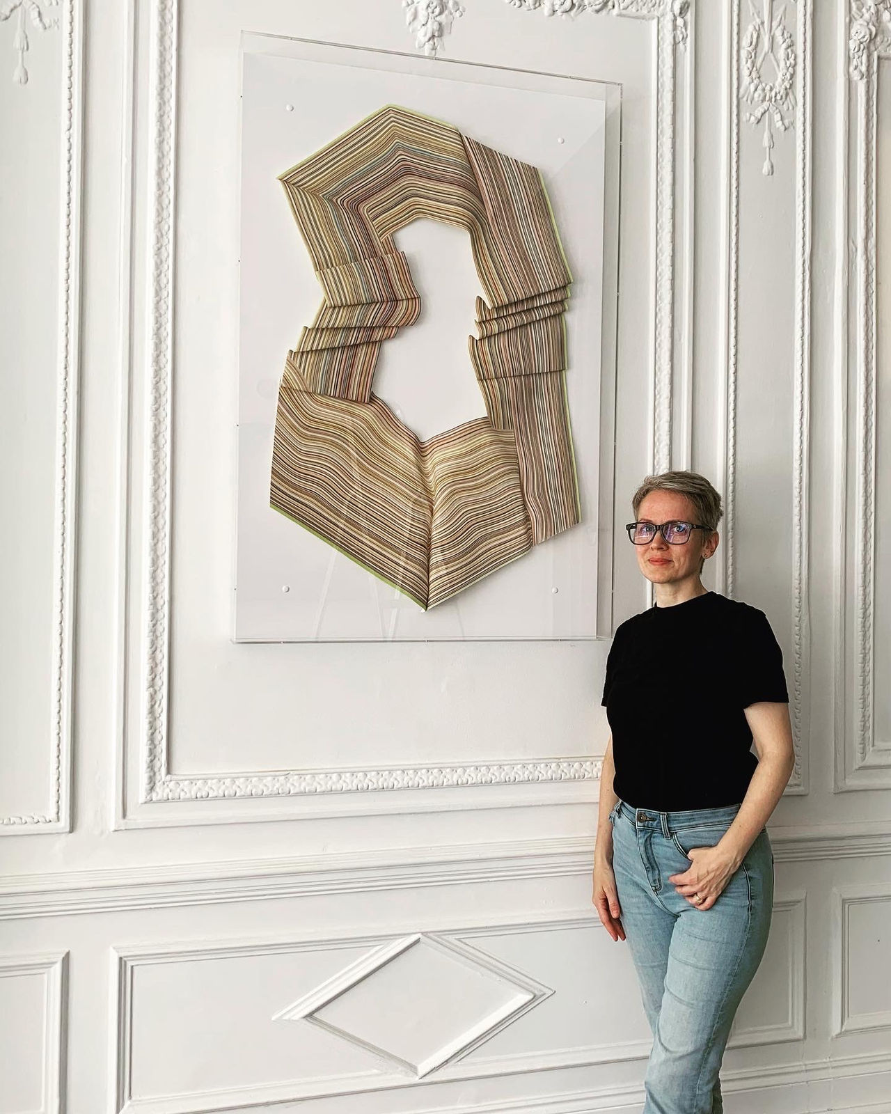 Artist with piece at Unity in Variety IX Group Show in London.