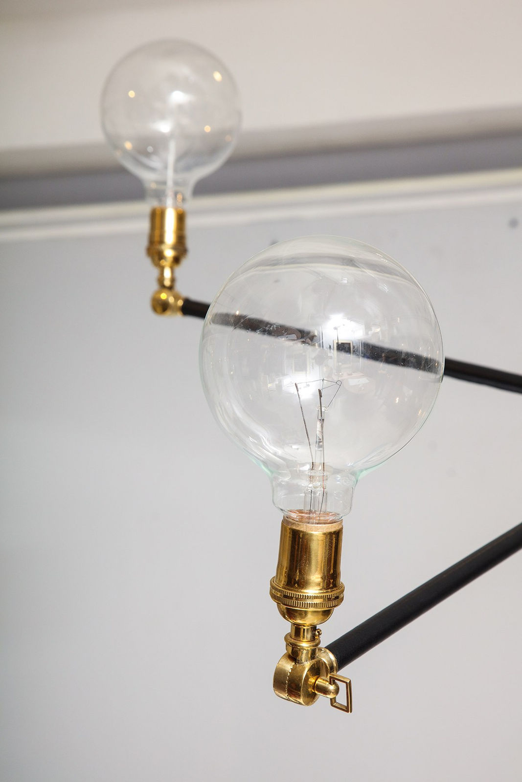 Custom Sculptural Leather and Brass Four-Arm Fixture with Articulating Arms