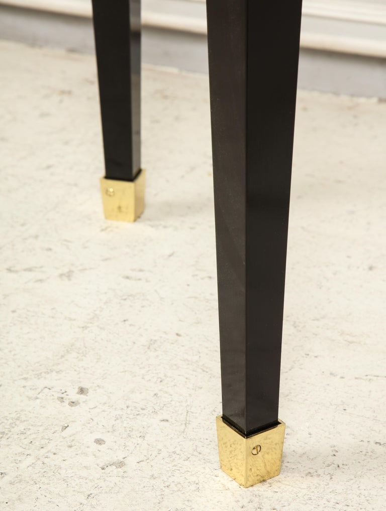 Custom Pair of Ebonized Demilune Consoles with Inlaid Brass Top