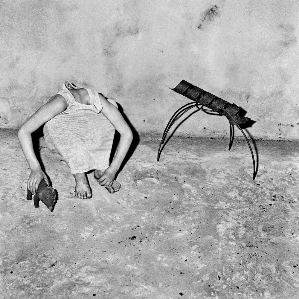 Roger Ballen, Head inside shirt, 2001