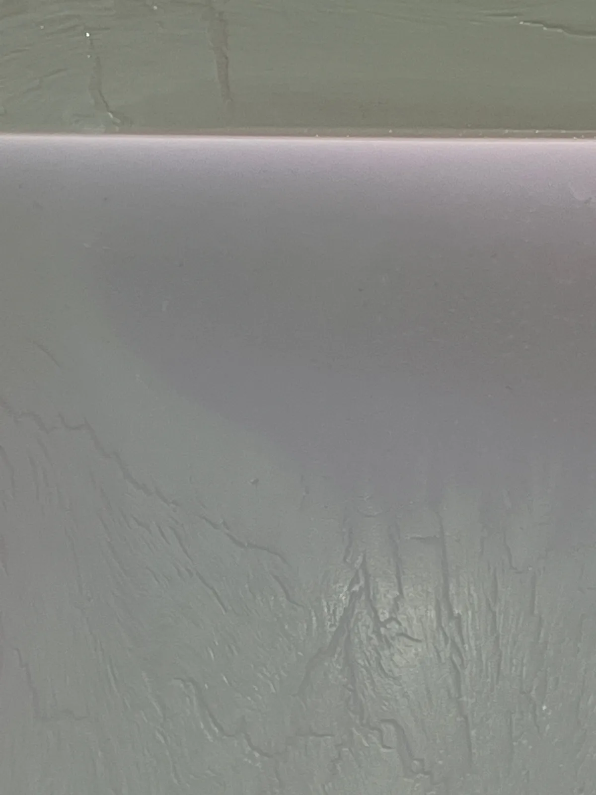 abstract work made of horizontally aligned segments in desaturated tones of green