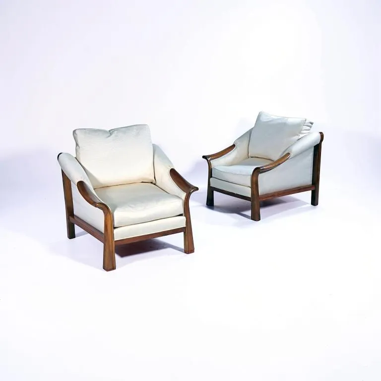 TRAVAIL ART DÉCO, Pair of Art Deco Club Chairs in the style of Pierre Chareau , 1985