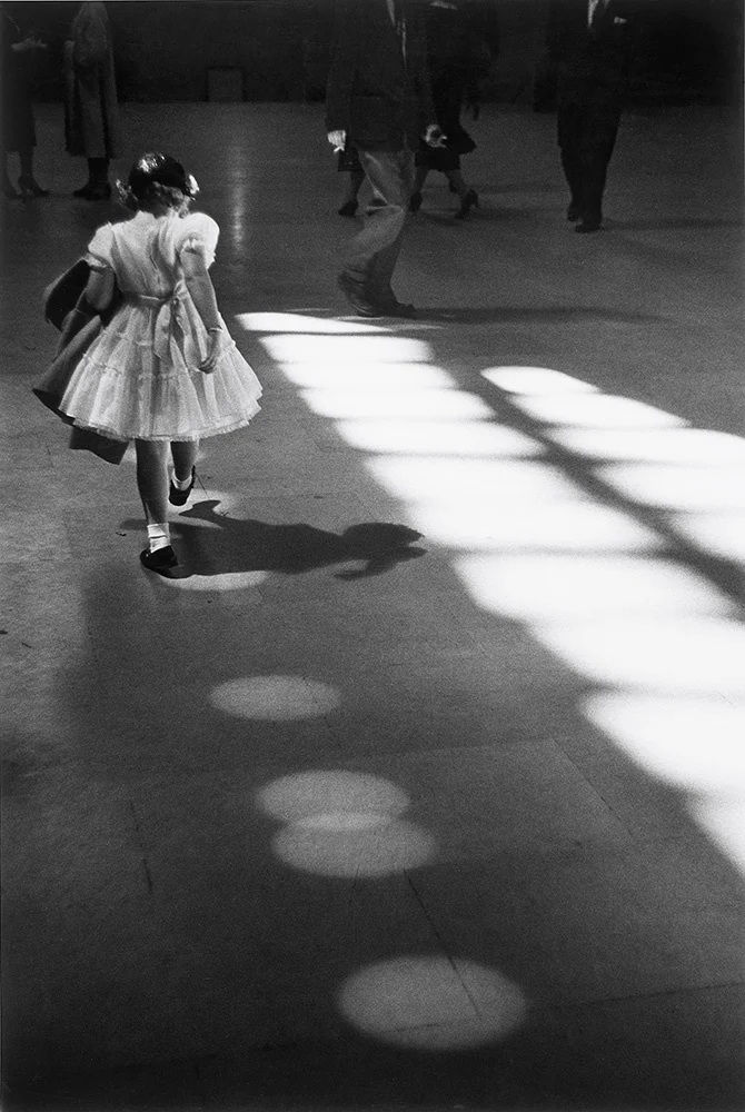 Louis Stettner, Girl Playing in Circles, Penn Station, 1954, printed 1980's