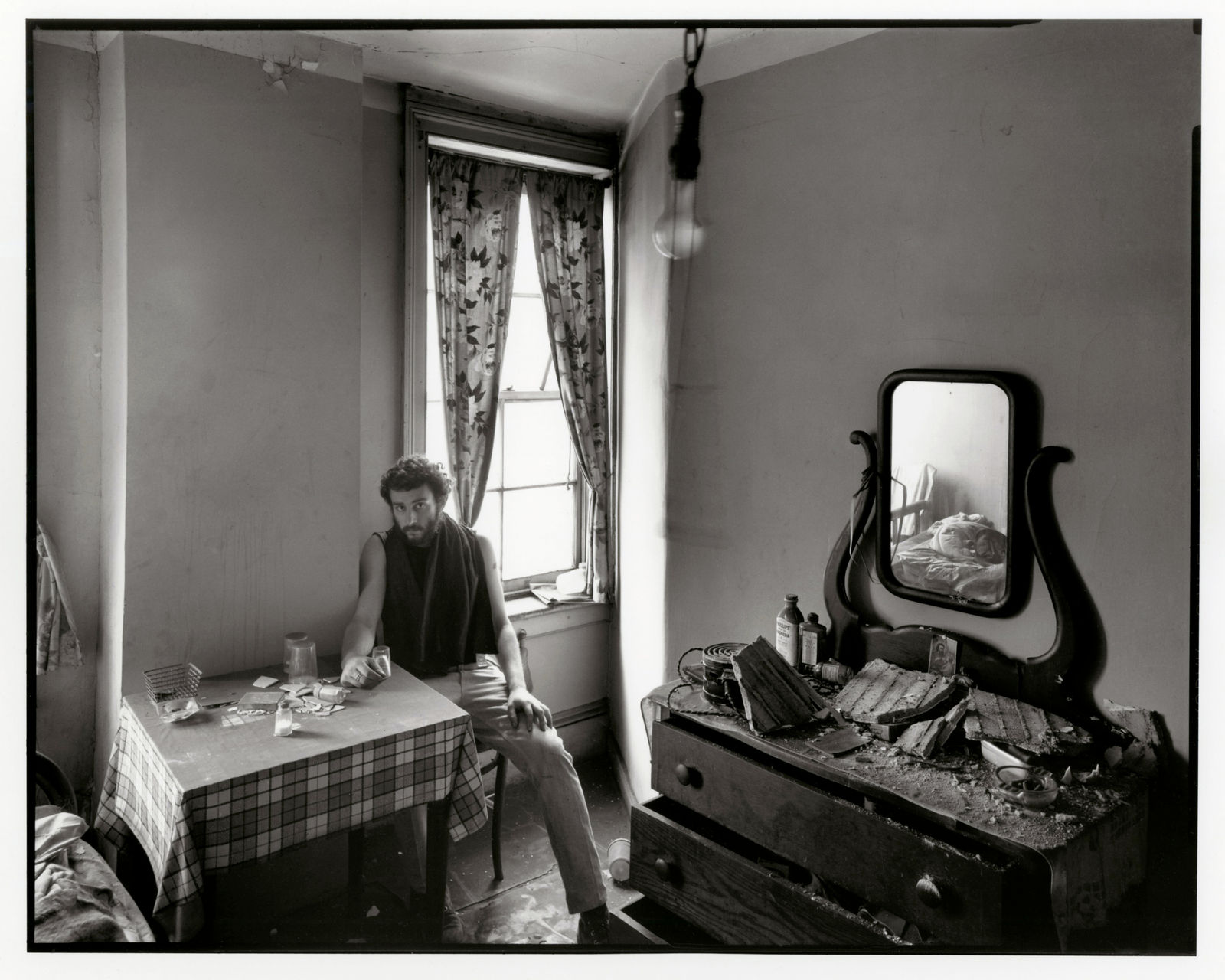 Danny Lyon, Self-portrait in an abandoned West Street hotel room, Lower Manhattan, 1967