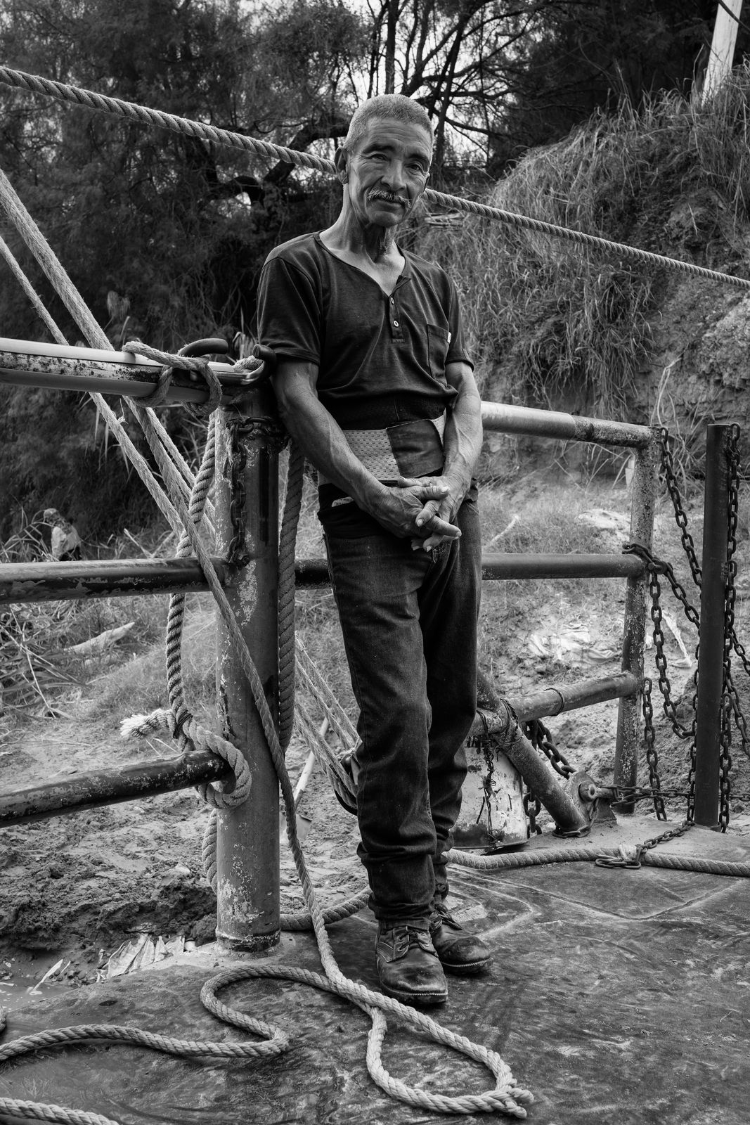 Richard Sharum, Hand-Pulled Ferry Operator. Los Ebanos Crossing. Rio Grande River, Texas, 2022