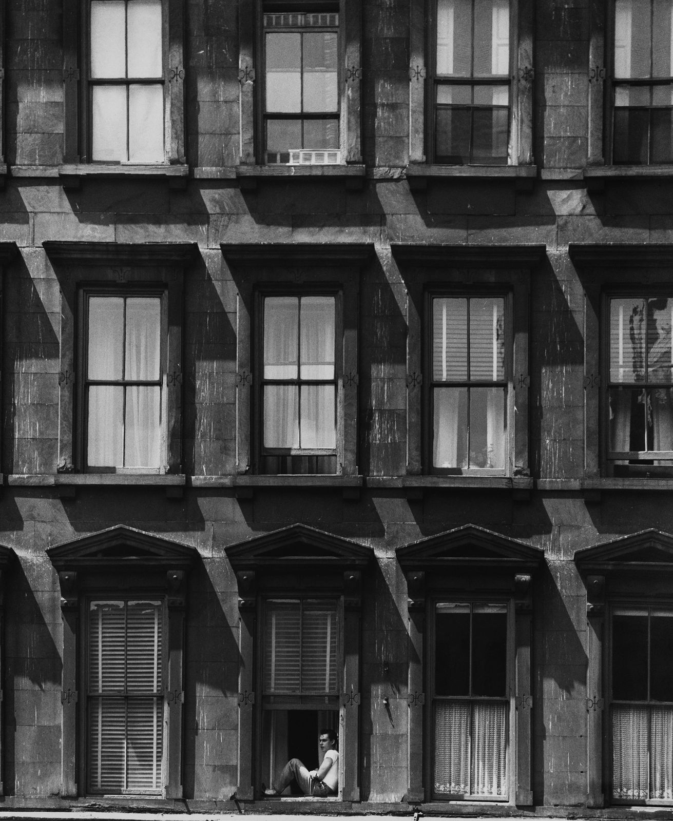 Todd Webb, Sixth Ave., New York (guy in window), 1948