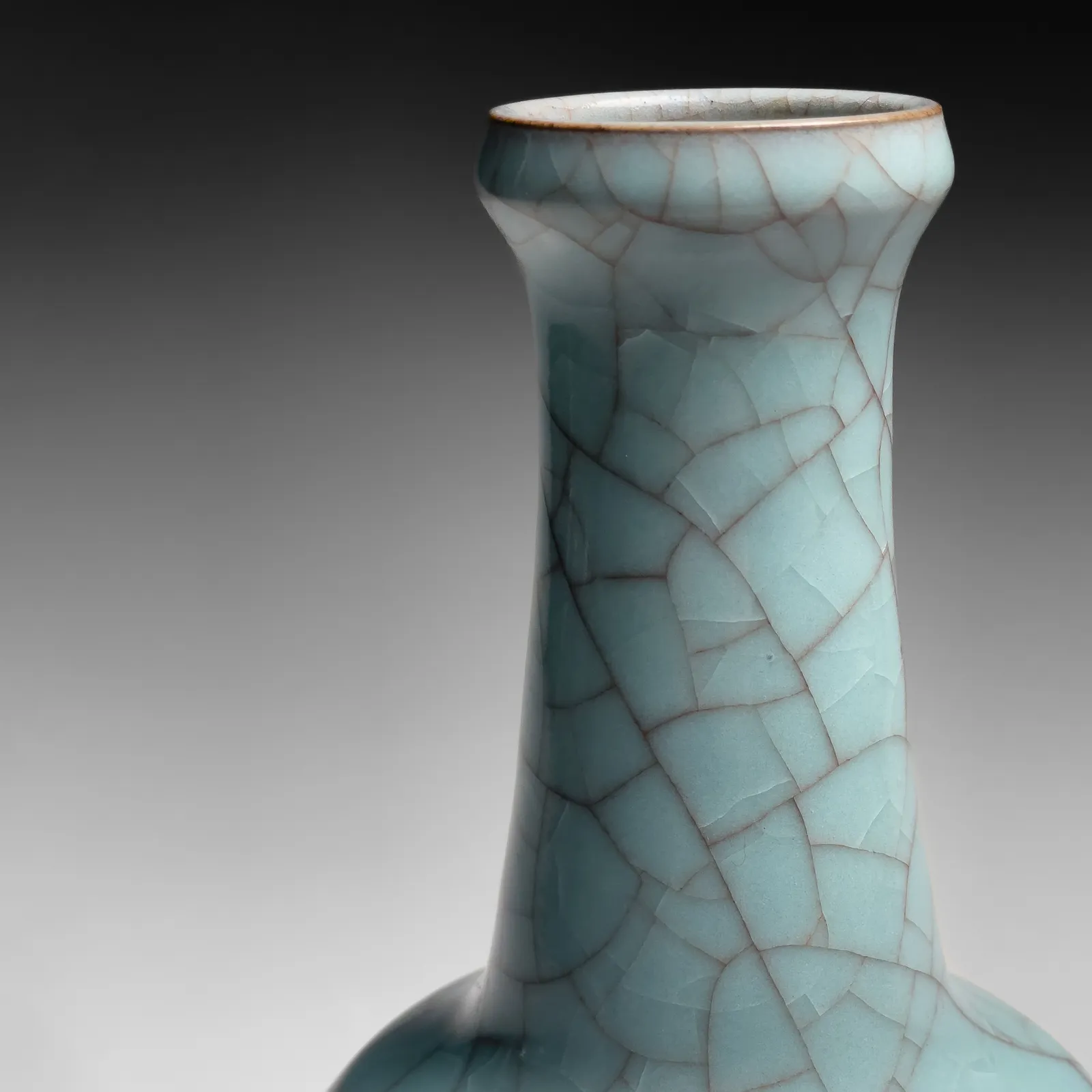 OKABE MINEO, Funseiji fulling block (kinuta)-shaped vessel with pale blue craquelure celadon glaze, ca. 1969