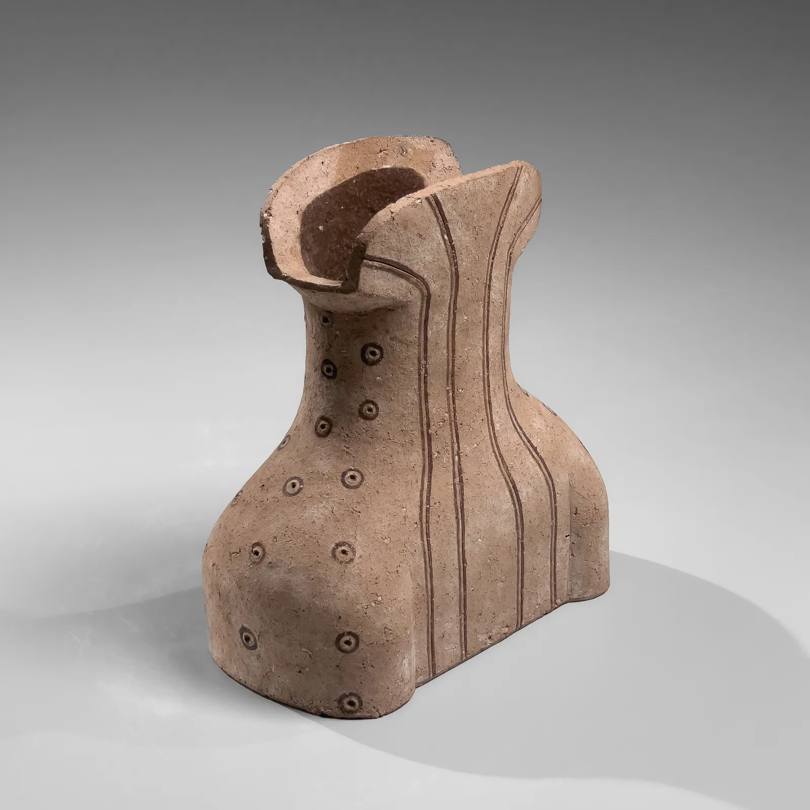 KAMODA SHŌJI, Cinched torso-like vessel with incised linear and dot motifs accentuated with slip and glaze, 1974