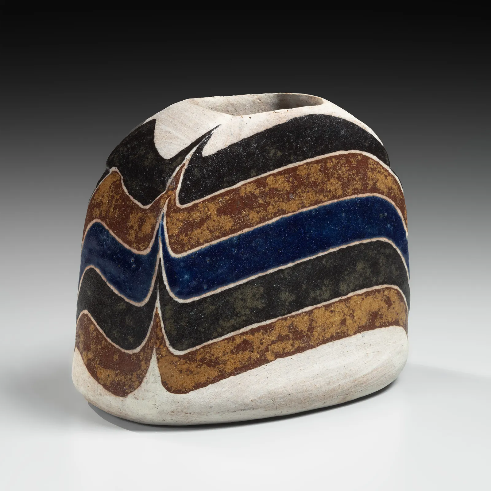KAMODA SHŌJI, Standing flattened, rounded rectangular vessel decorated with colored, curvaceous bands in light brown, ochre yellow, cream and blue overglaze enamel, 1975
