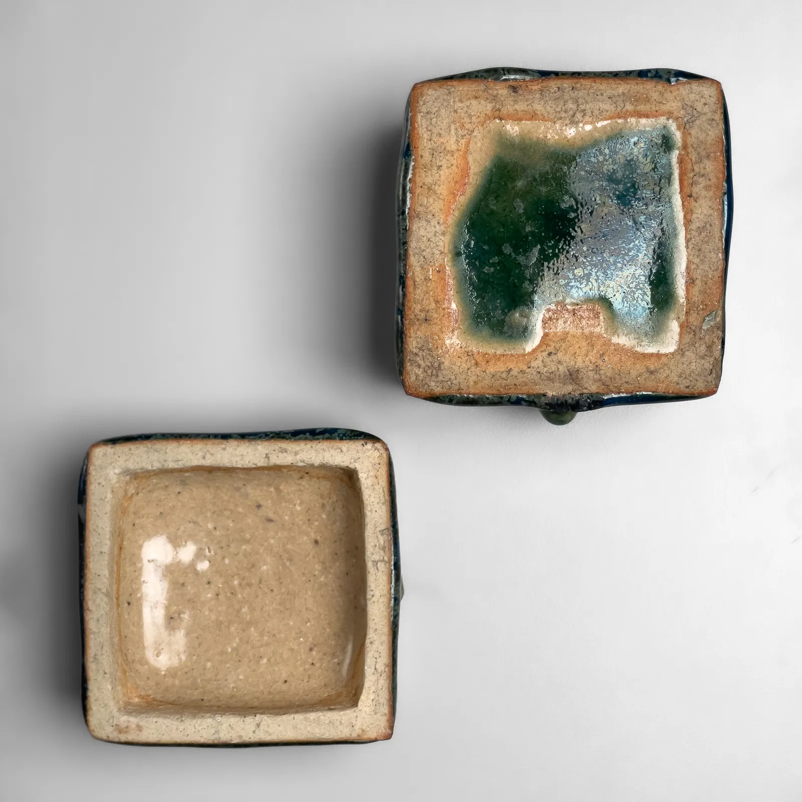 KAWAI KANJIRŌ, Square lidded container with green glaze and raised flower motif, ca. 1962