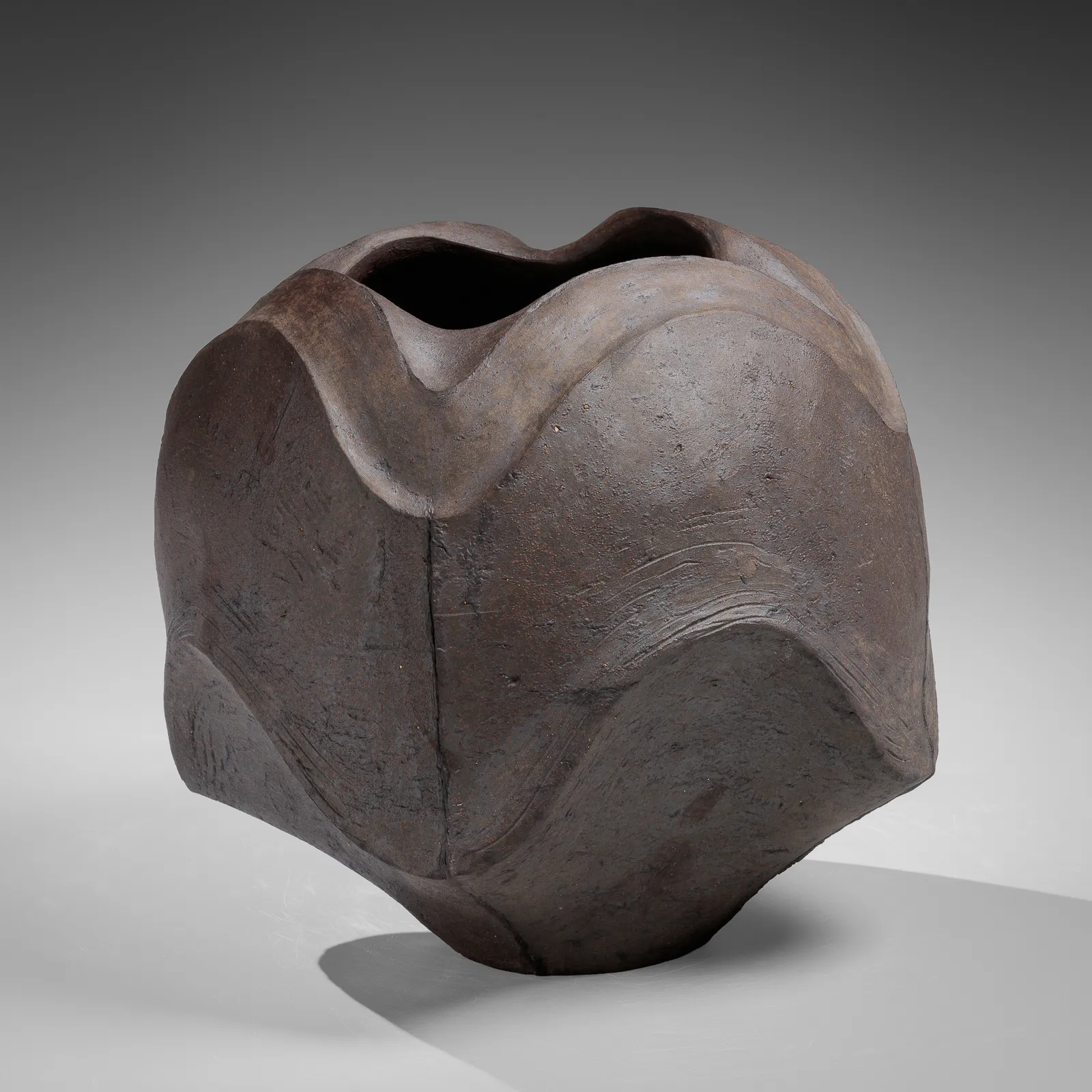 MORI TŌGAKU, Brownish-black porcelaneous stoneware vessel with undulating bands, November 1989