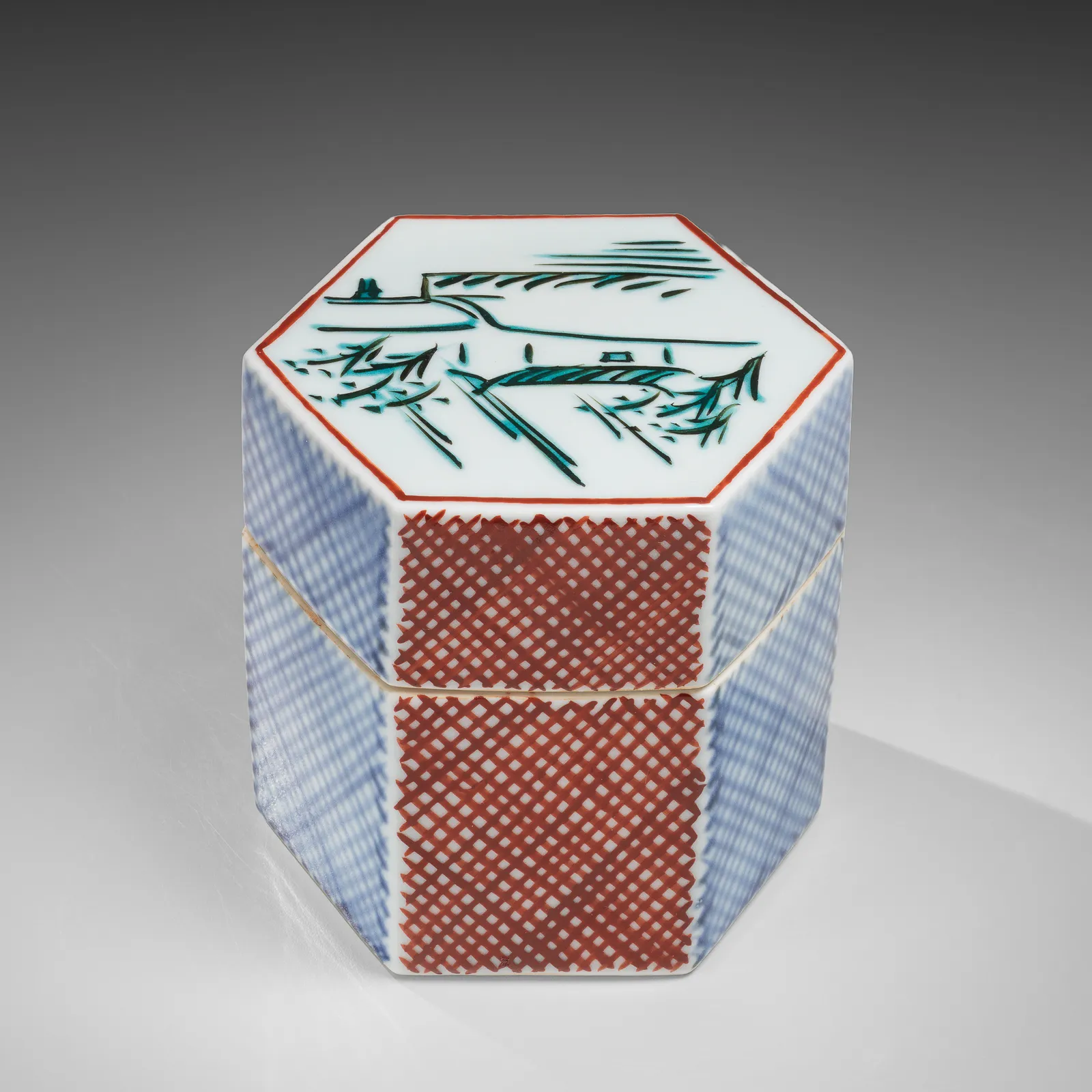 TOMIMOTO KENKICHI, Iro-e (enamel overglaze) hexagonal covered box with landscape motif of “Rain on the Yamato River”, 1960