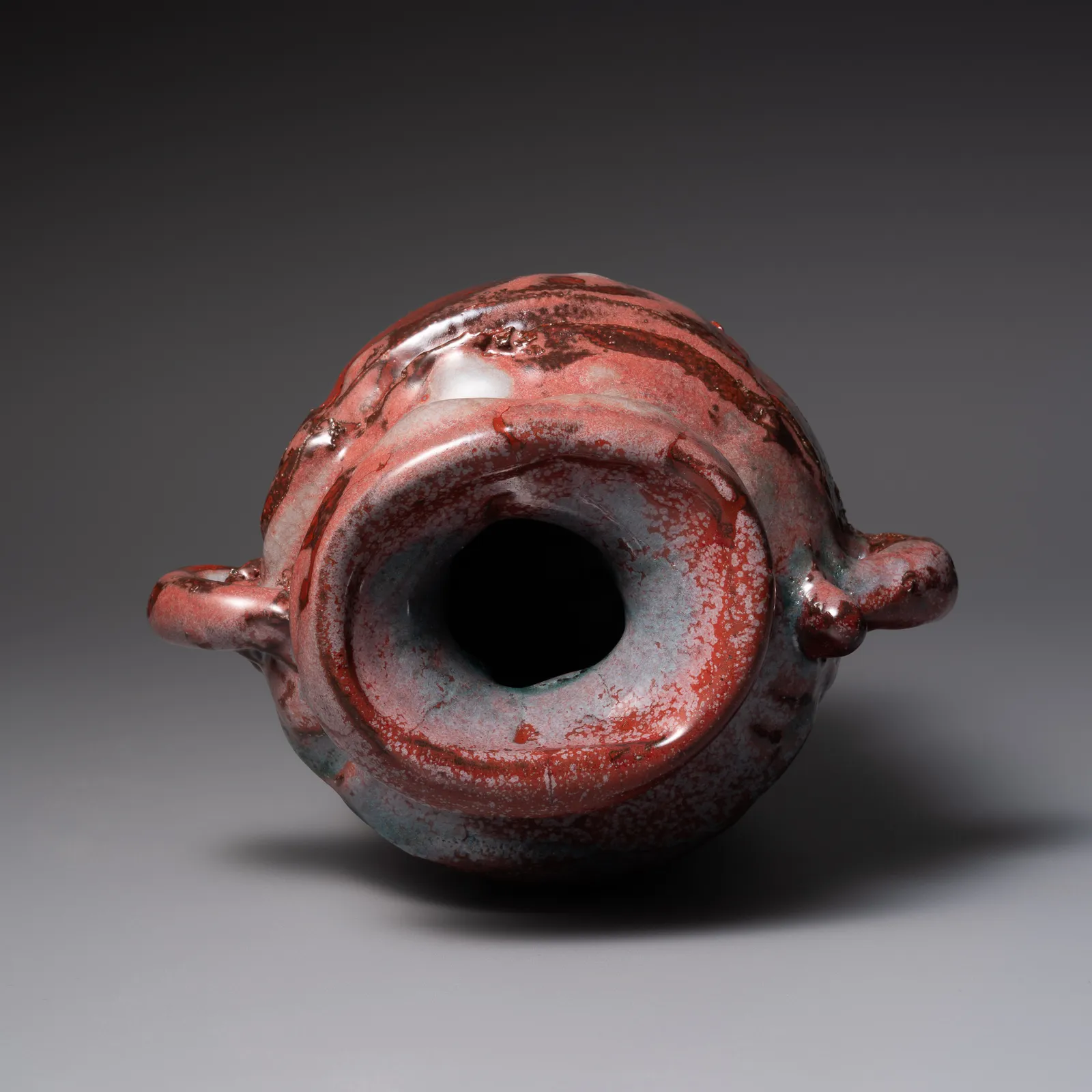 TANAKA SAJIRŌ, Shinsha (copper red) glazed handled vase with raised, flared mouth, 2025