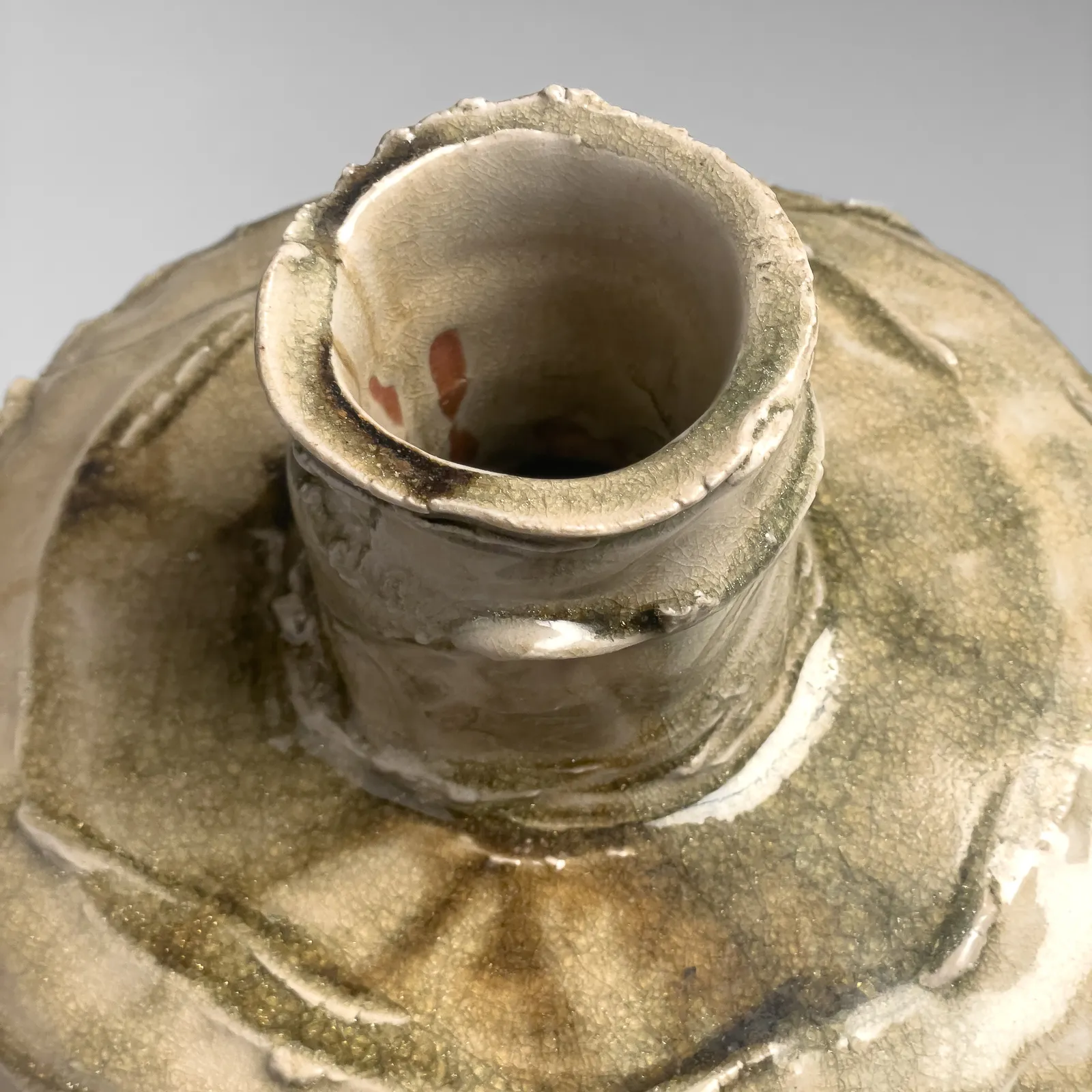 OKABE MINEO, Ko-Seto ash-glazed shouldered vessel with incised abstract curvilinear motifs, 1971