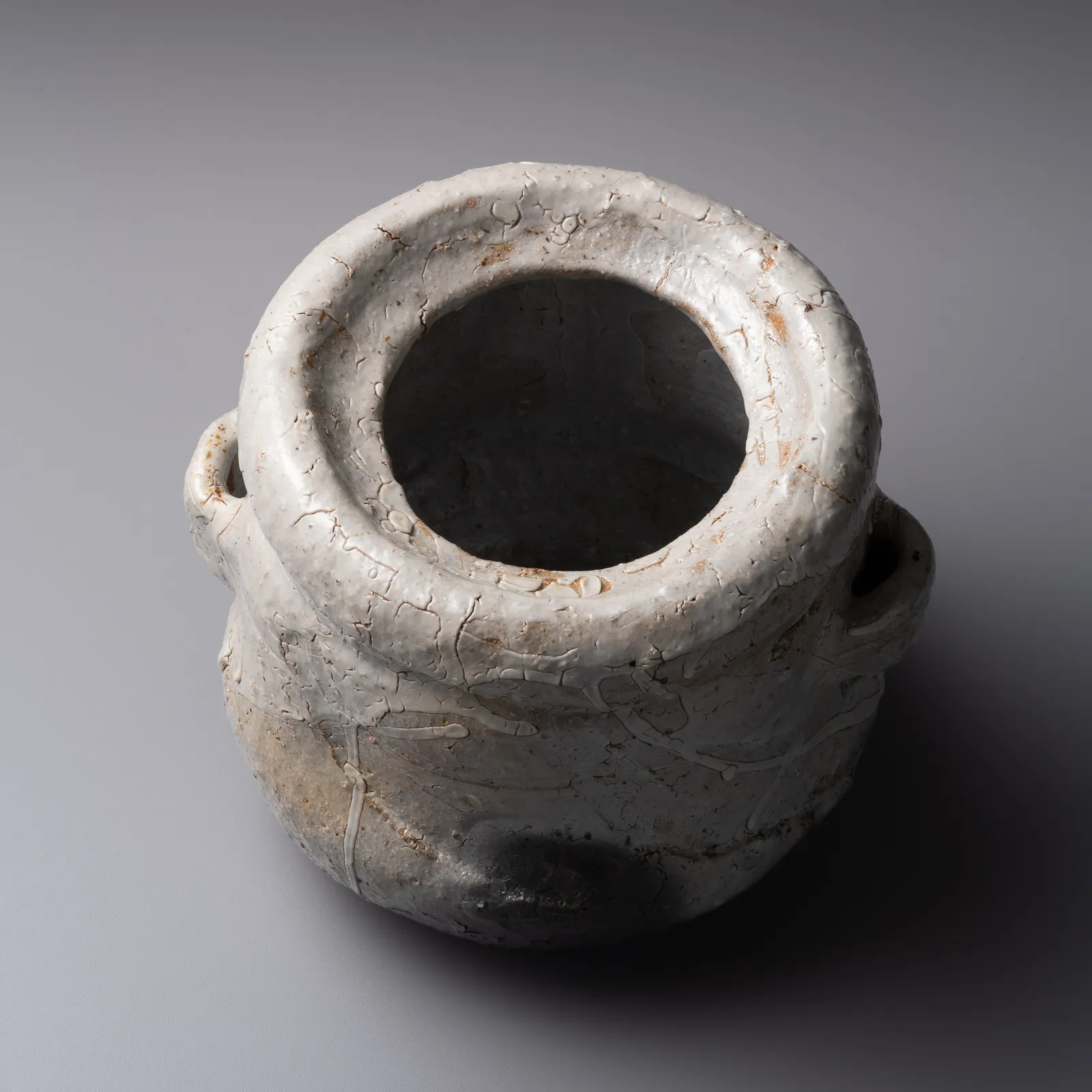 TANAKA SAJIRŌ, Karatsu waterjar with two lugs and recessed, knobbed lid, titled, As Clouds Form, 2025